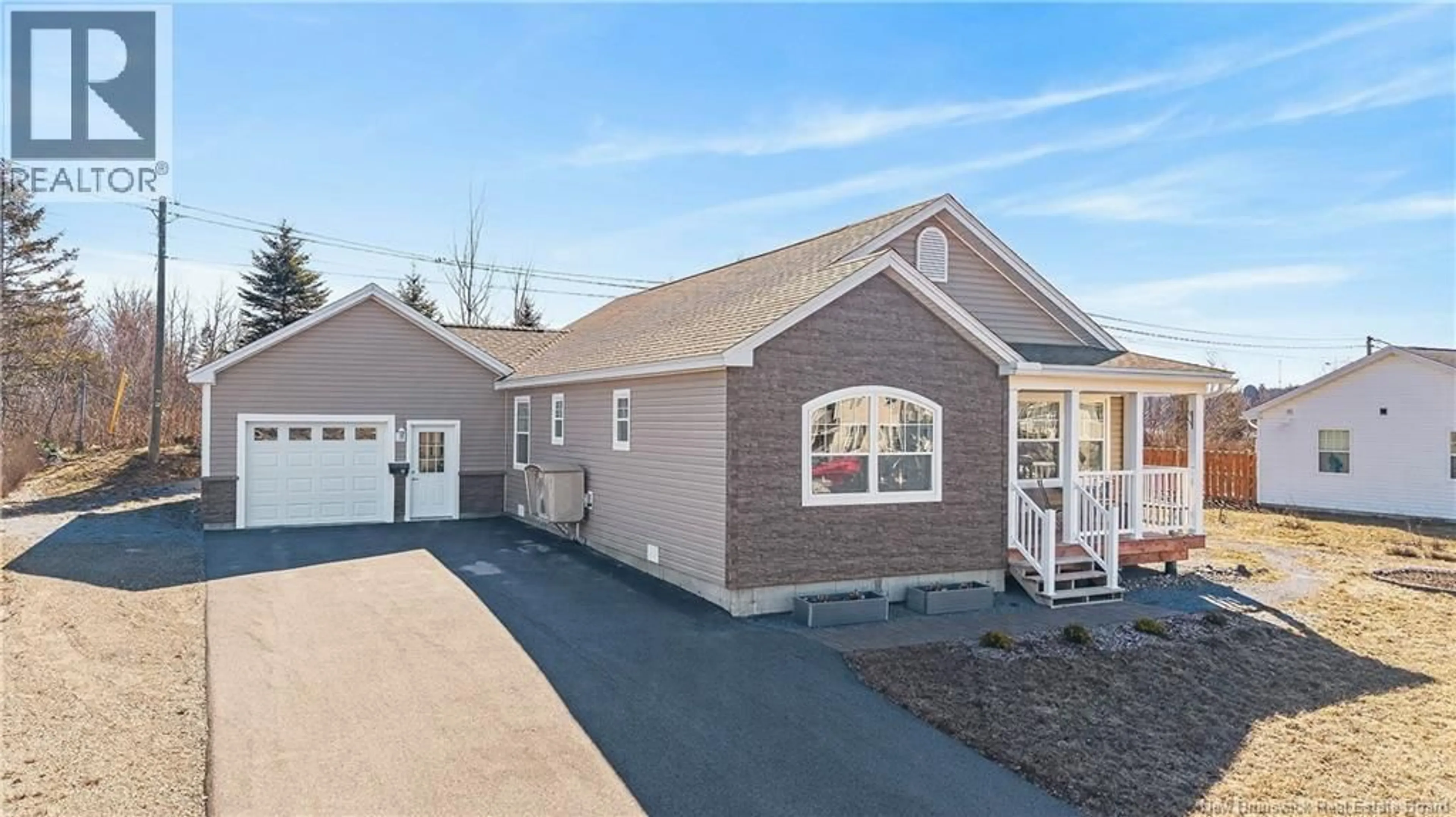 Home with vinyl exterior material, street for 10 RIVER STREET, St. Stephen New Brunswick E3L3H8