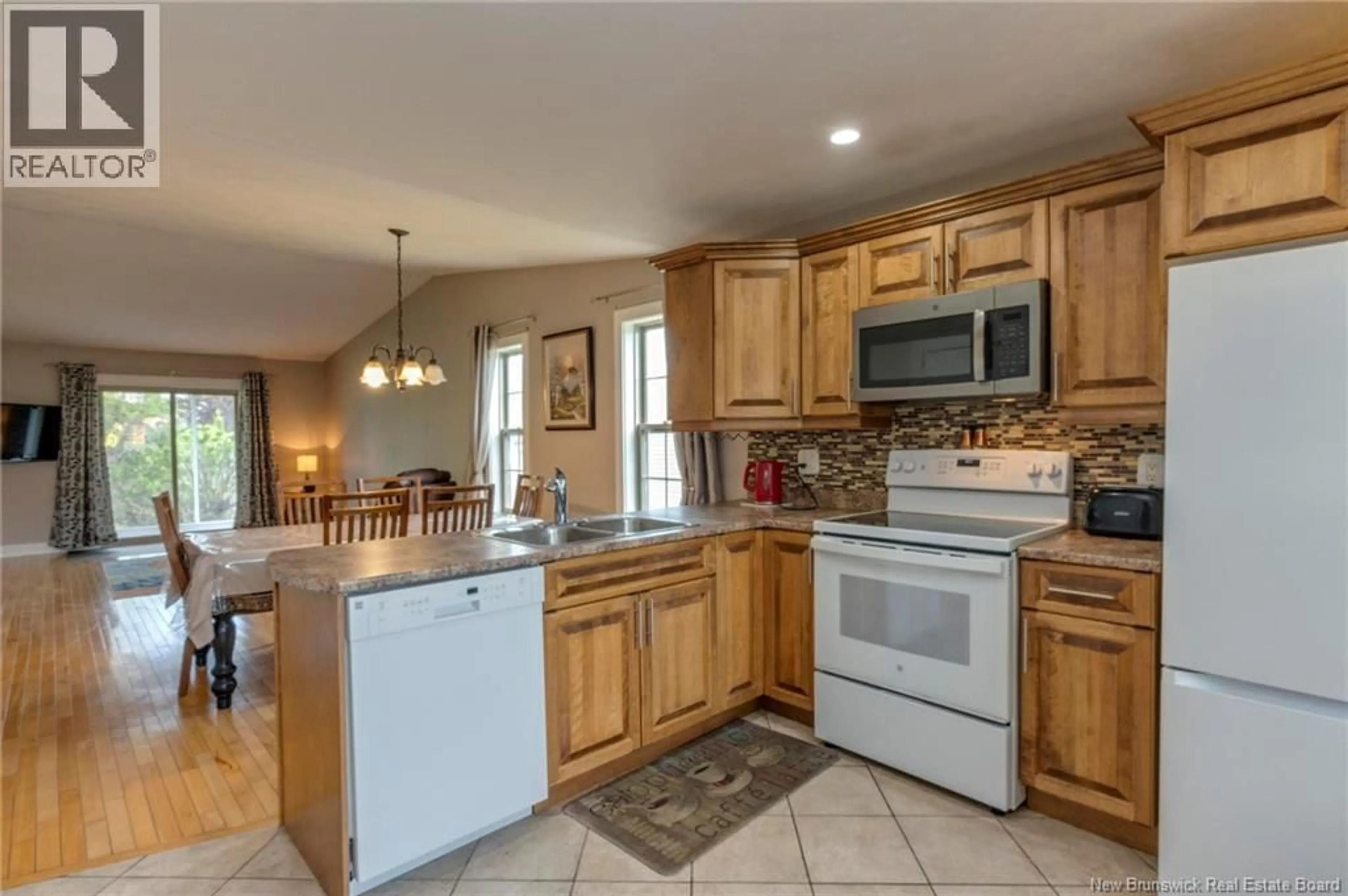 Open concept kitchen, ceramic/tile floor for 72 COLBY CRESCENT, Moncton New Brunswick E1G5M3