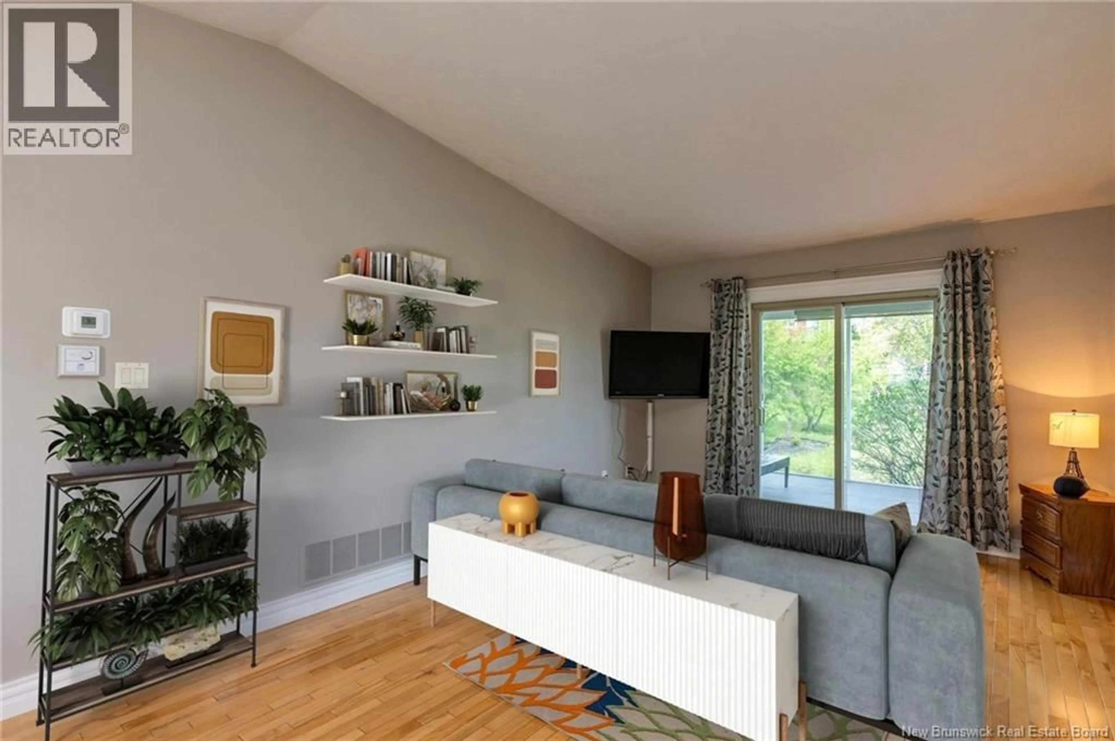 Living room with furniture, wood/laminate floor for 72 COLBY CRESCENT, Moncton New Brunswick E1G5M3