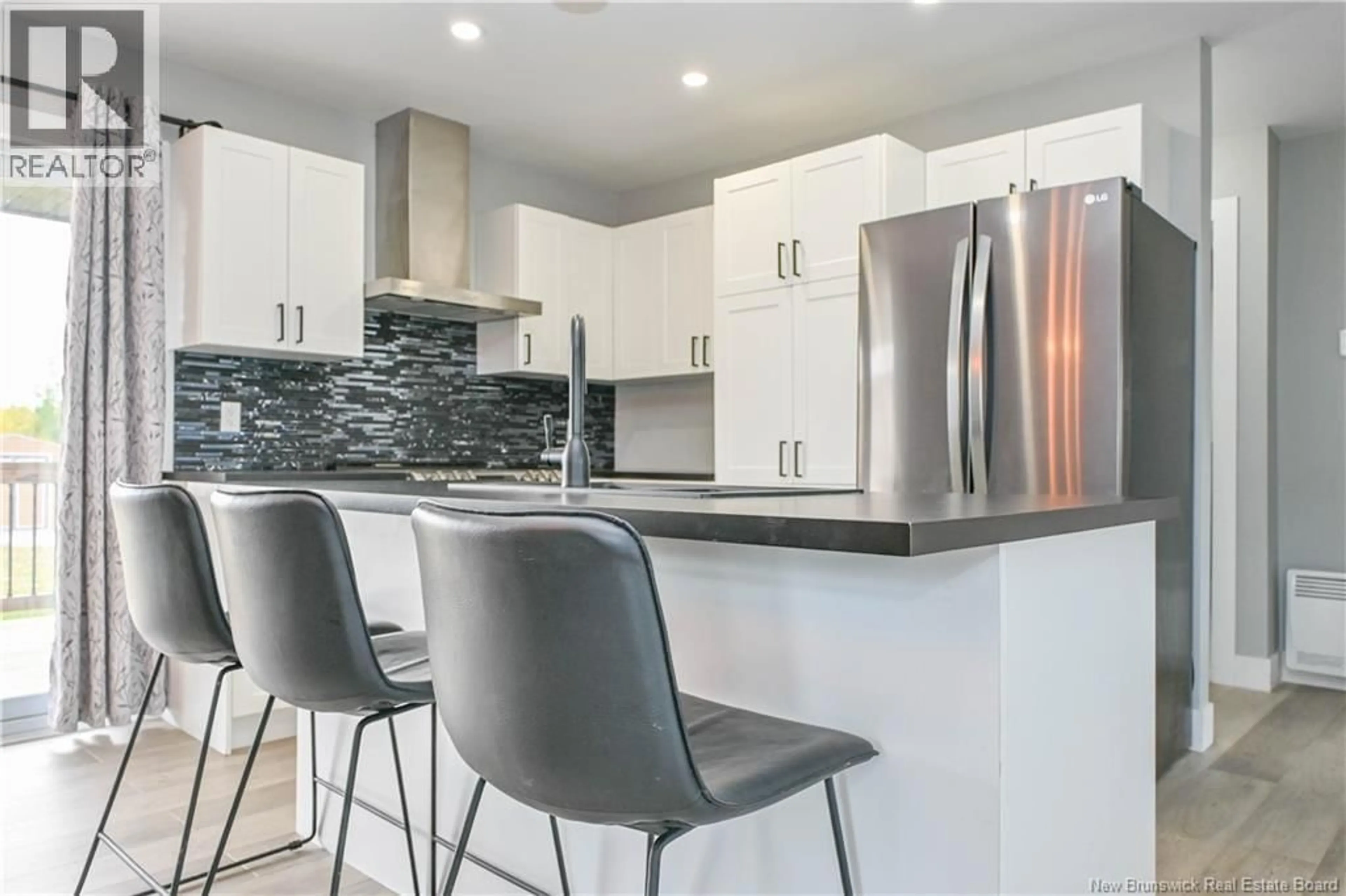 Open concept kitchen, ceramic/tile floor for 5892 ROUTE 340, Haut-Paquetville New Brunswick E8R1S8