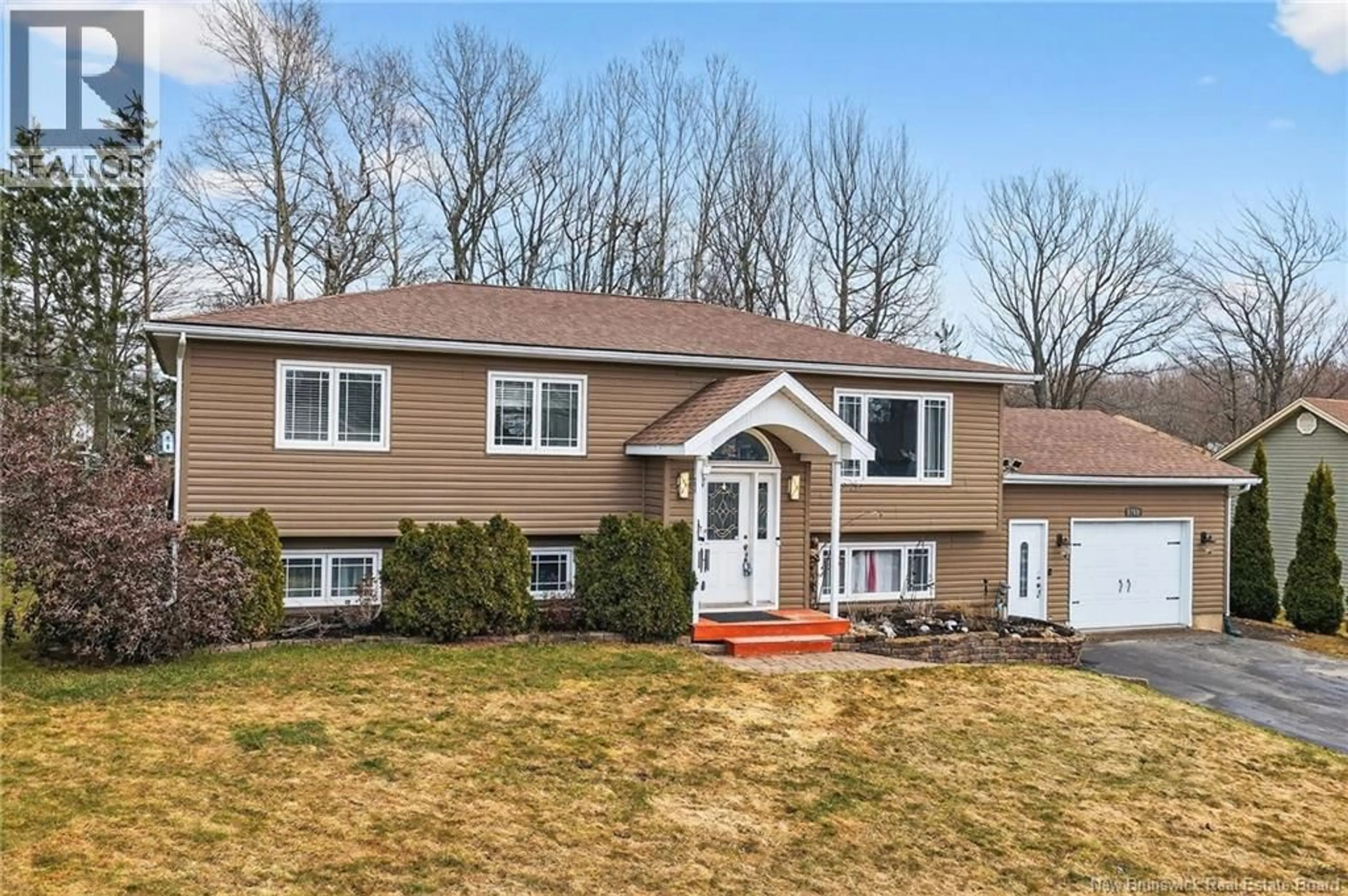 Home with vinyl exterior material, street for 167 FAIRVIEW KNOLL DRIVE, Moncton New Brunswick E1A6L2