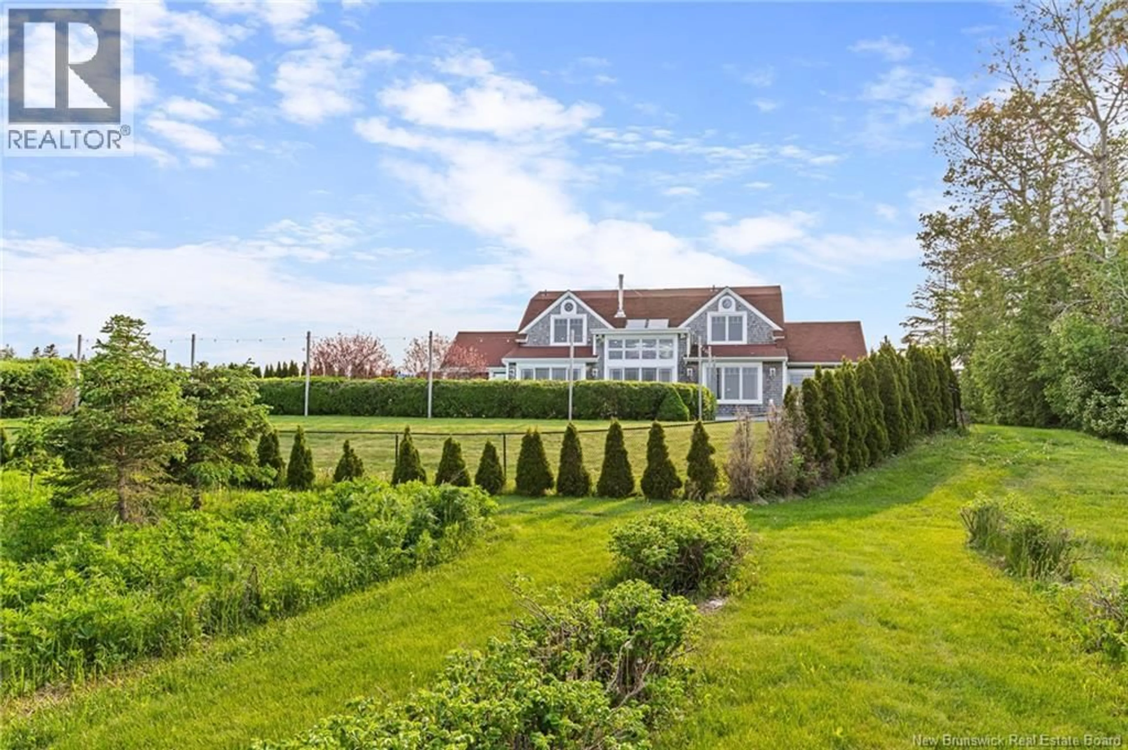 A pic from outside/outdoor area/front of a property/back of a property/a pic from drone, water/lake/river/ocean view for 3482 ROUTE 134, Shediac Cape New Brunswick E4P3J4