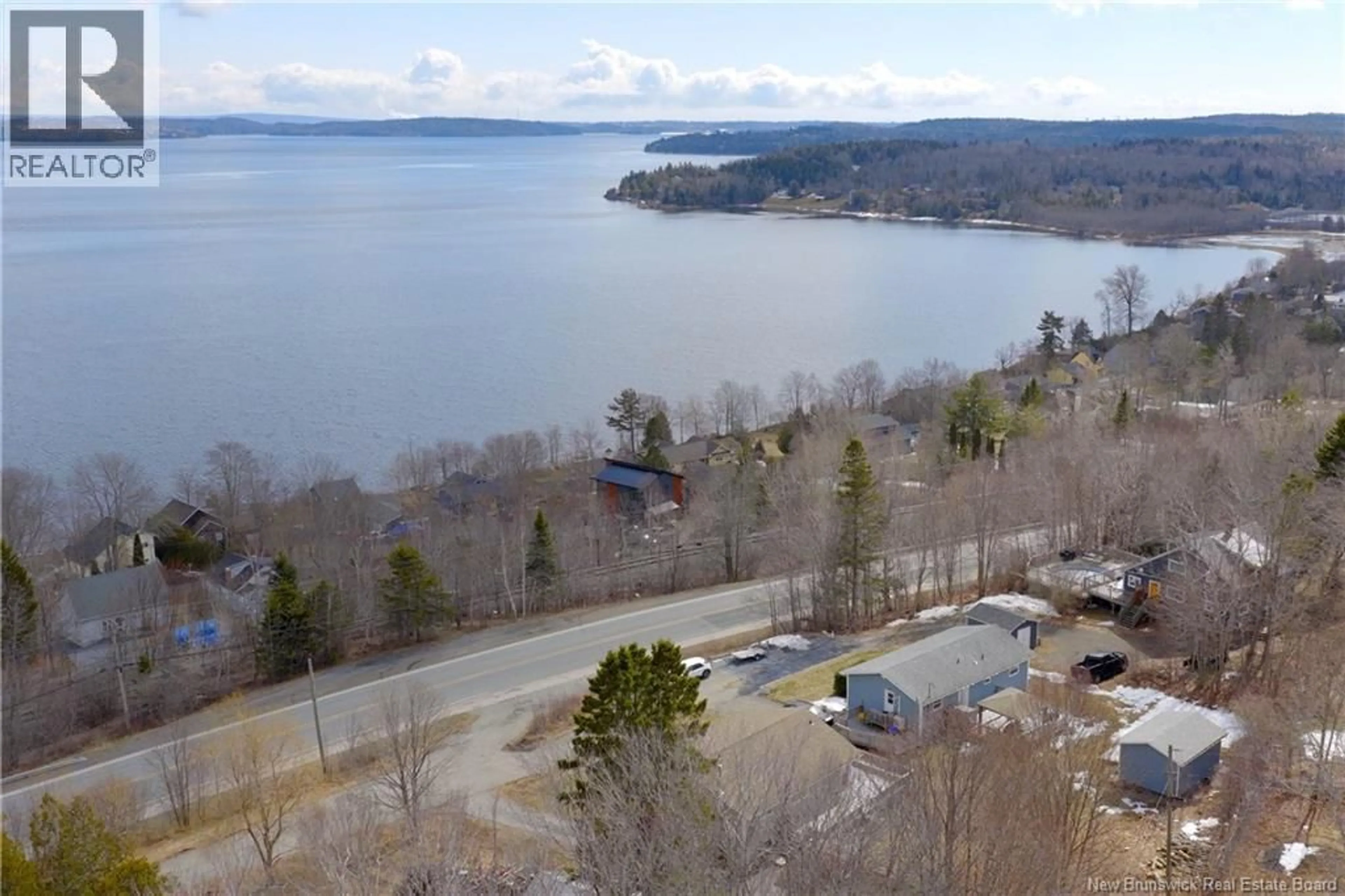 A pic from outside/outdoor area/front of a property/back of a property/a pic from drone, water/lake/river/ocean view for 9 PIONEER LANE, Grand Bay-Westfield New Brunswick E5K1R8