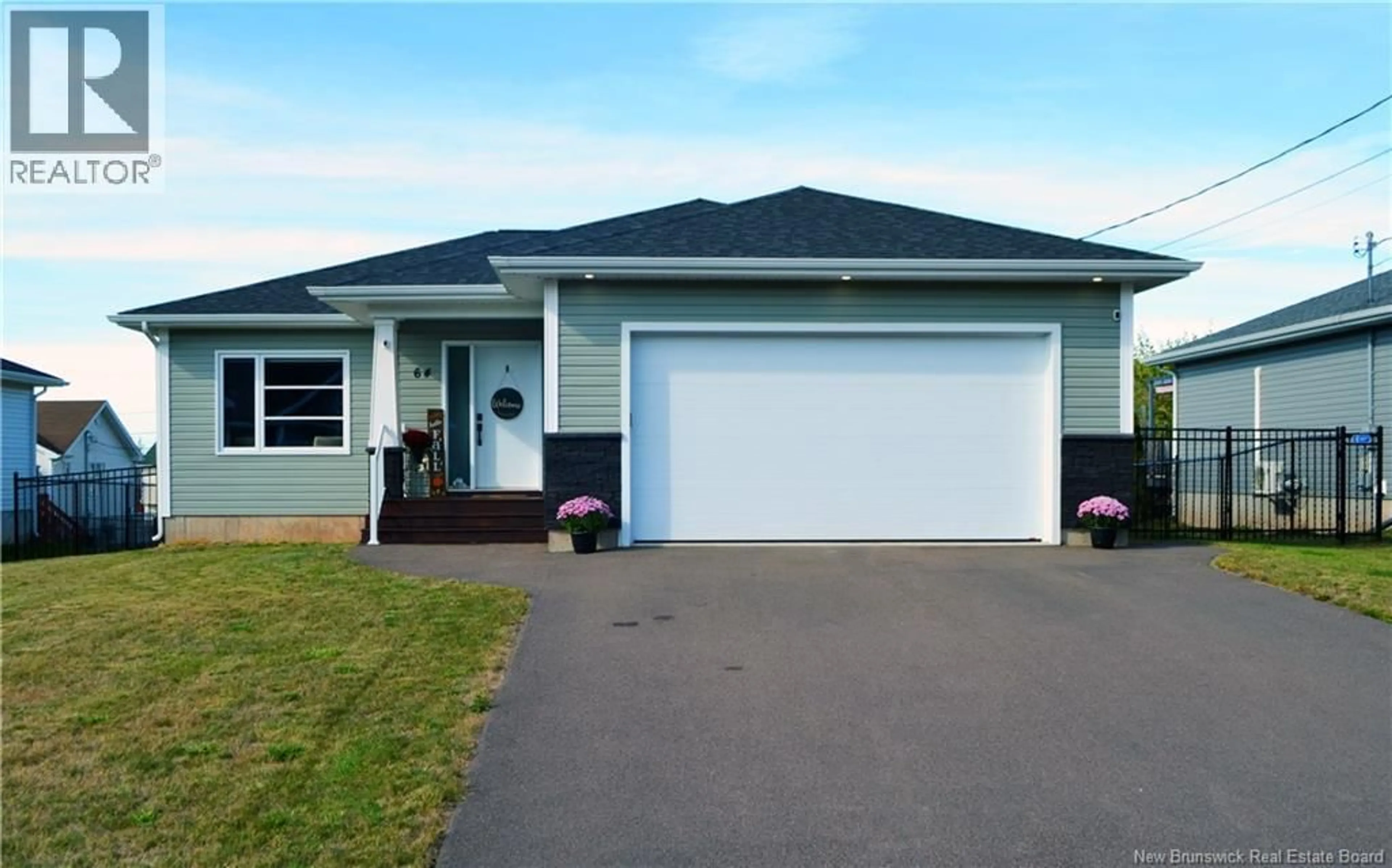 Home with vinyl exterior material, street for 64 AMITY STREET, Moncton New Brunswick E1G0S3