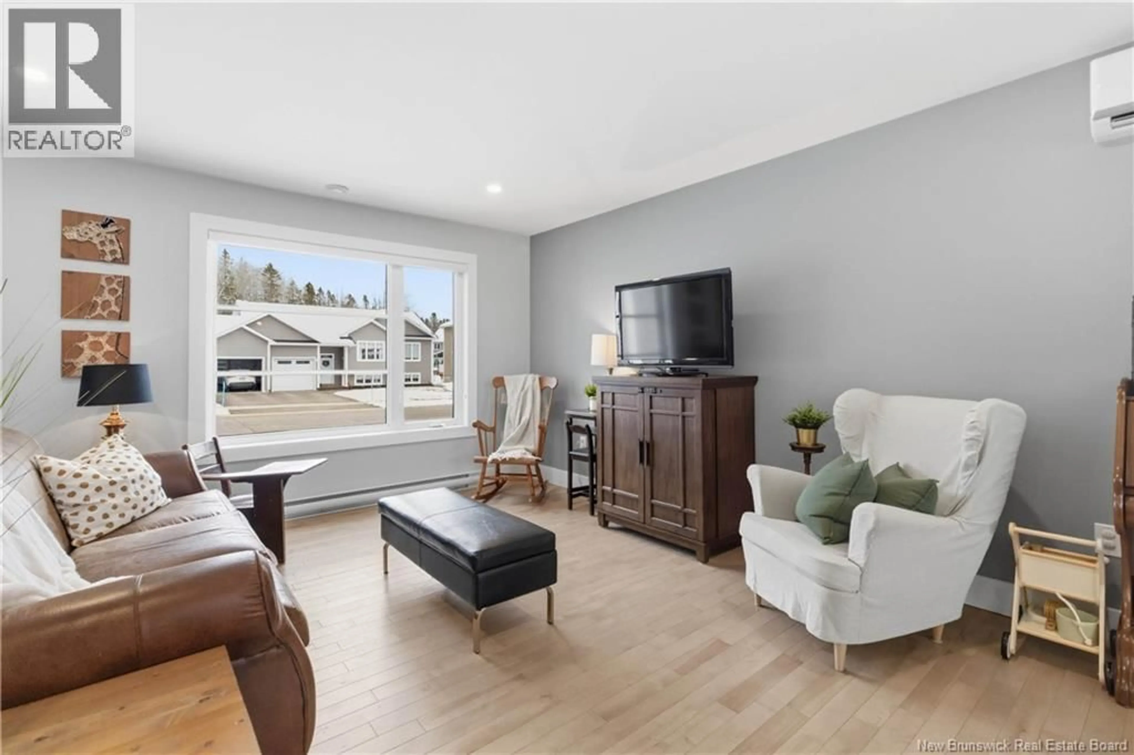 Living room with furniture, unknown for 64 AMITY STREET, Moncton New Brunswick E1G0S3