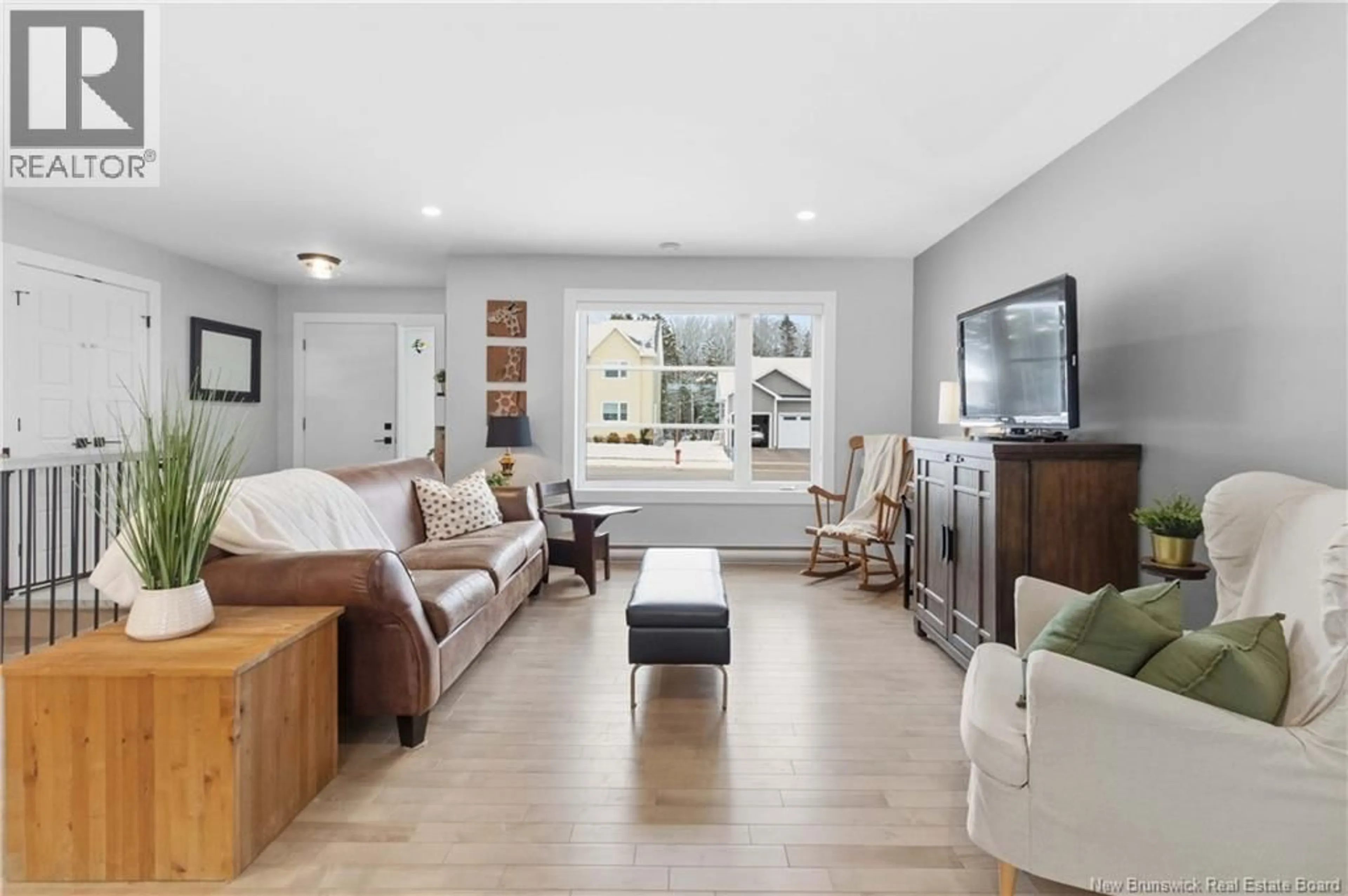 Living room with furniture, unknown for 64 AMITY STREET, Moncton New Brunswick E1G0S3