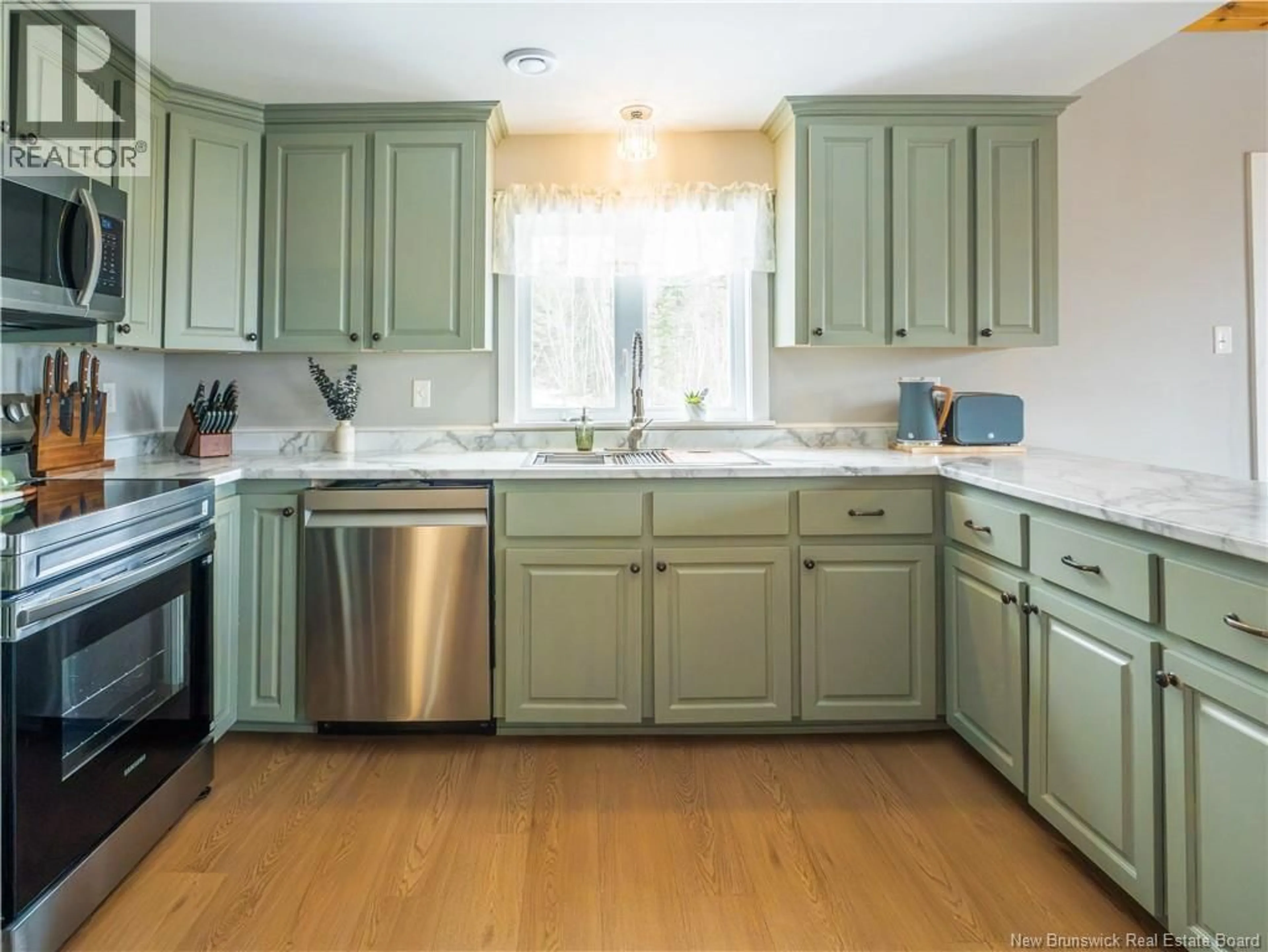 Open concept kitchen, wood/laminate floor for 3052 LOWER CAMBRIDGE ROAD, Cambridge-Narrows New Brunswick E2E1Z6