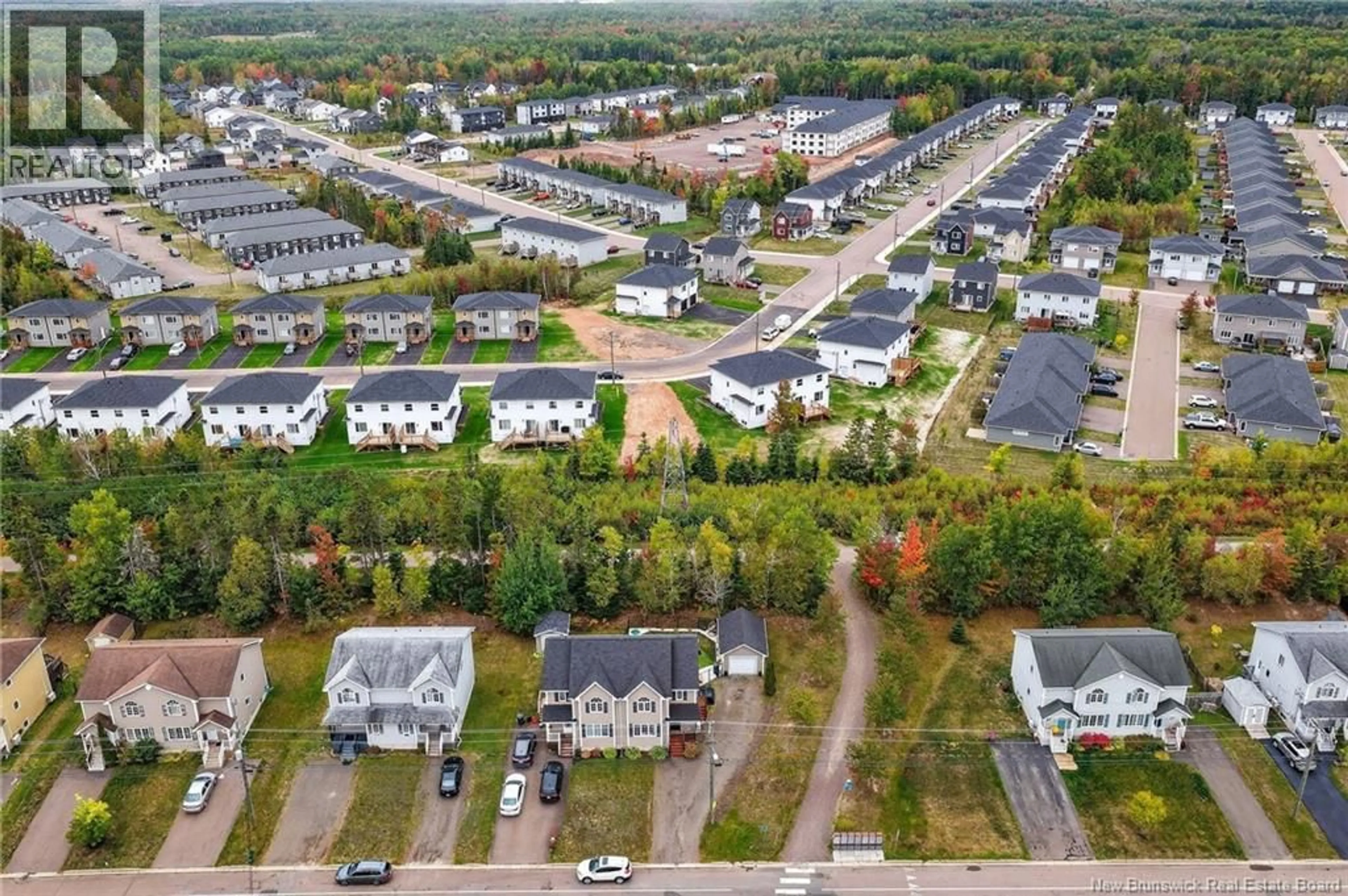 A pic from outside/outdoor area/front of a property/back of a property/a pic from drone, street for 482 TWIN OAKS DRIVE, Moncton New Brunswick E1G0G3