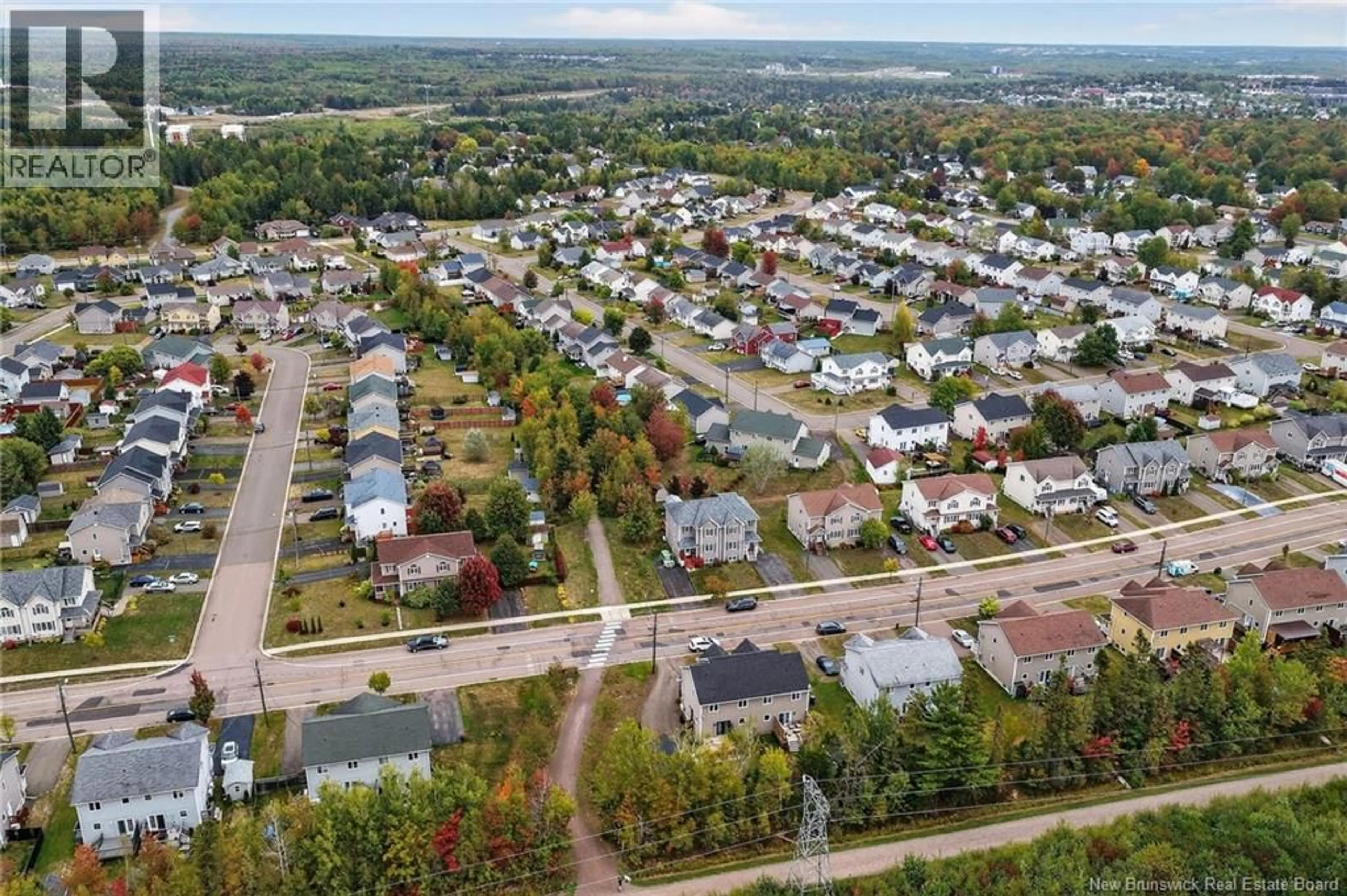 A pic from outside/outdoor area/front of a property/back of a property/a pic from drone, street for 482 TWIN OAKS DRIVE, Moncton New Brunswick E1G0G3