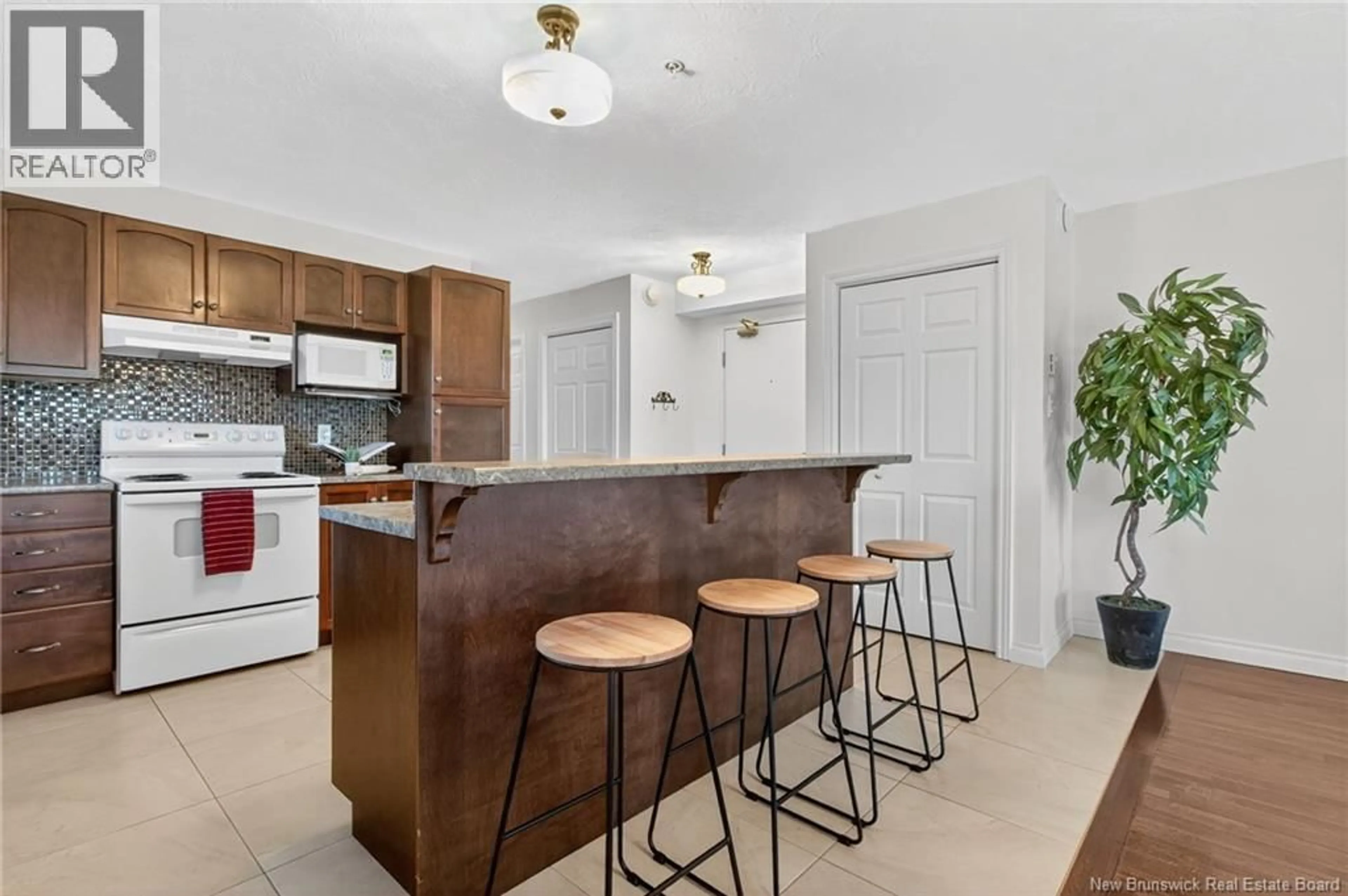 Open concept kitchen, ceramic/tile floor for 301 - 204 COVERDALE ROAD, Riverview New Brunswick E1B0J2