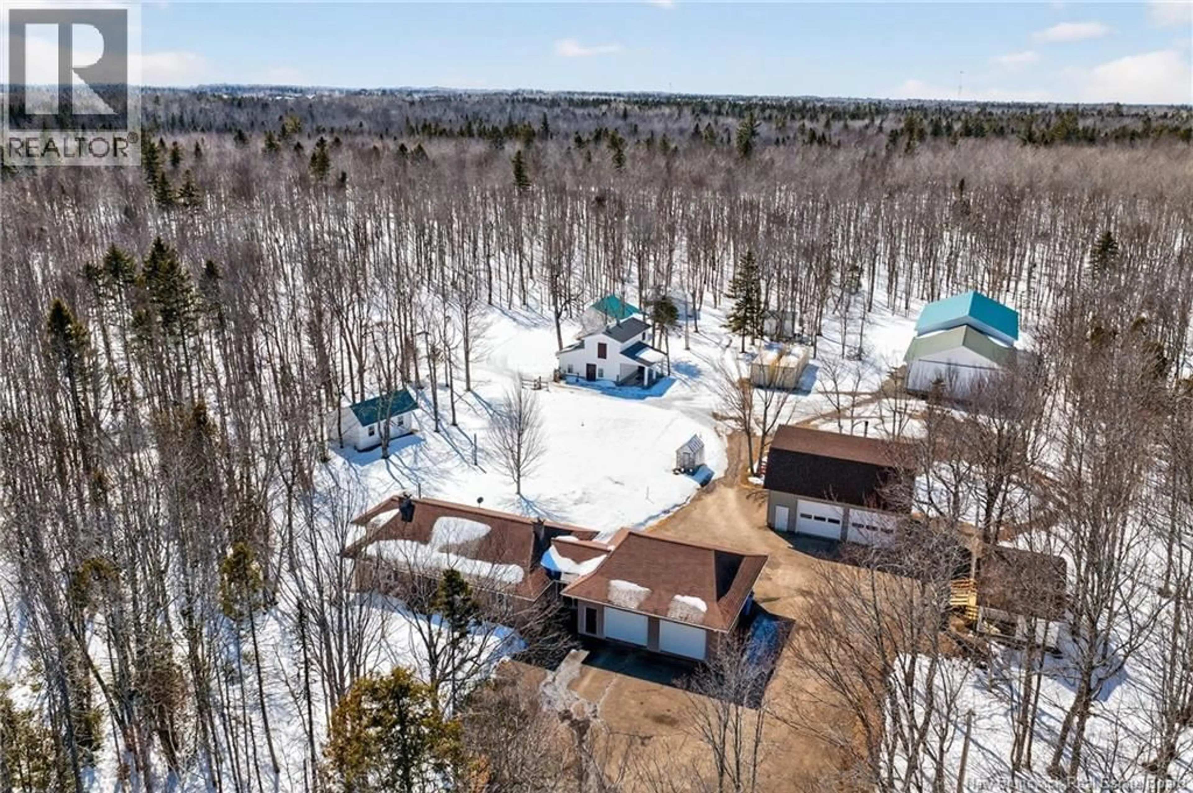 A pic from outside/outdoor area/front of a property/back of a property/a pic from drone, forest/trees view for 231 RUE DELAGARDE RUE, Saint-Isidore New Brunswick E8M1H7