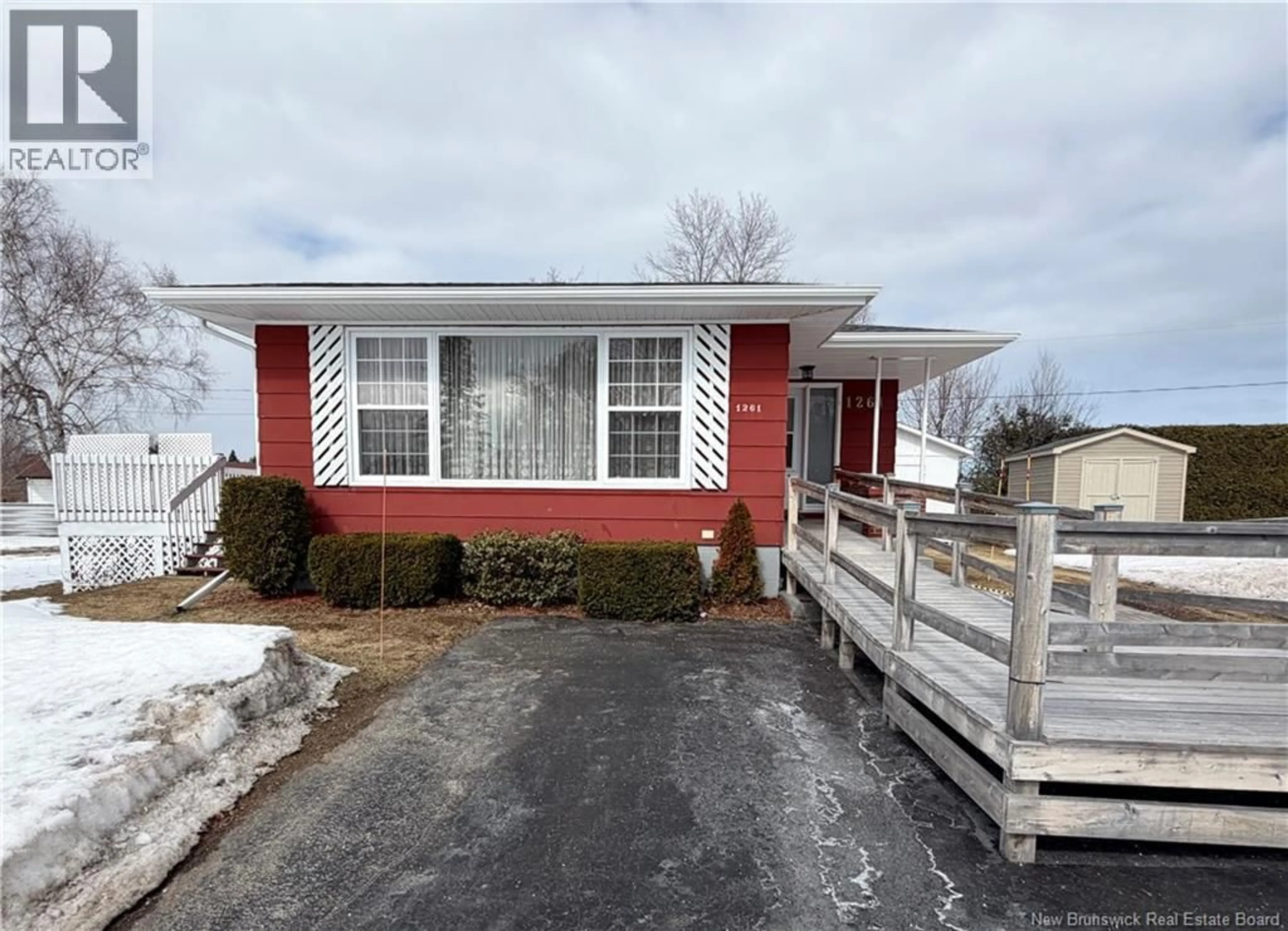 Home with vinyl exterior material, street for 1261 WHELTON, Bathurst New Brunswick E2A3S8