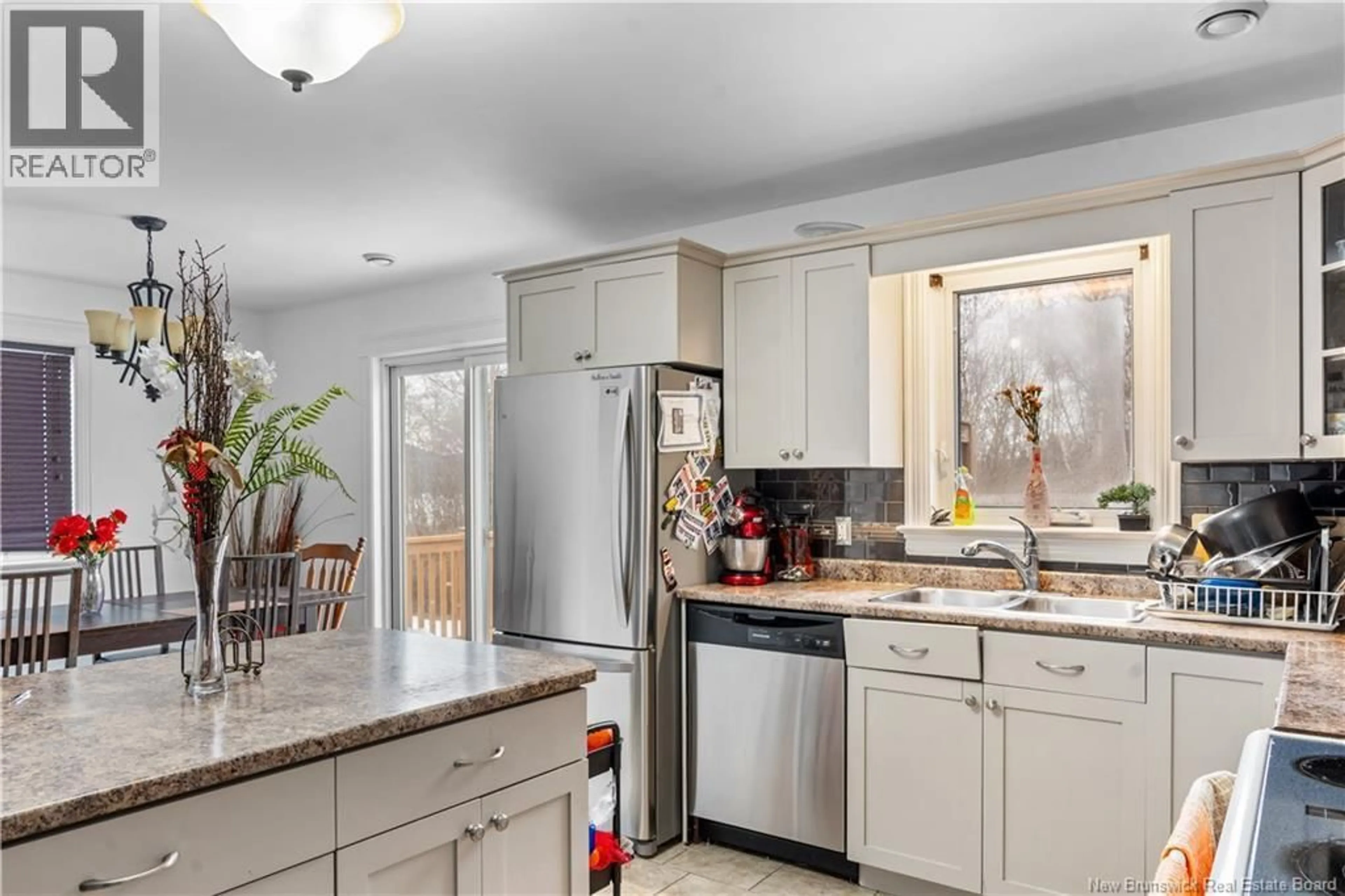 Open concept kitchen, ceramic/tile floor for 899 BERNARD STREET, Dieppe New Brunswick E1A4S6