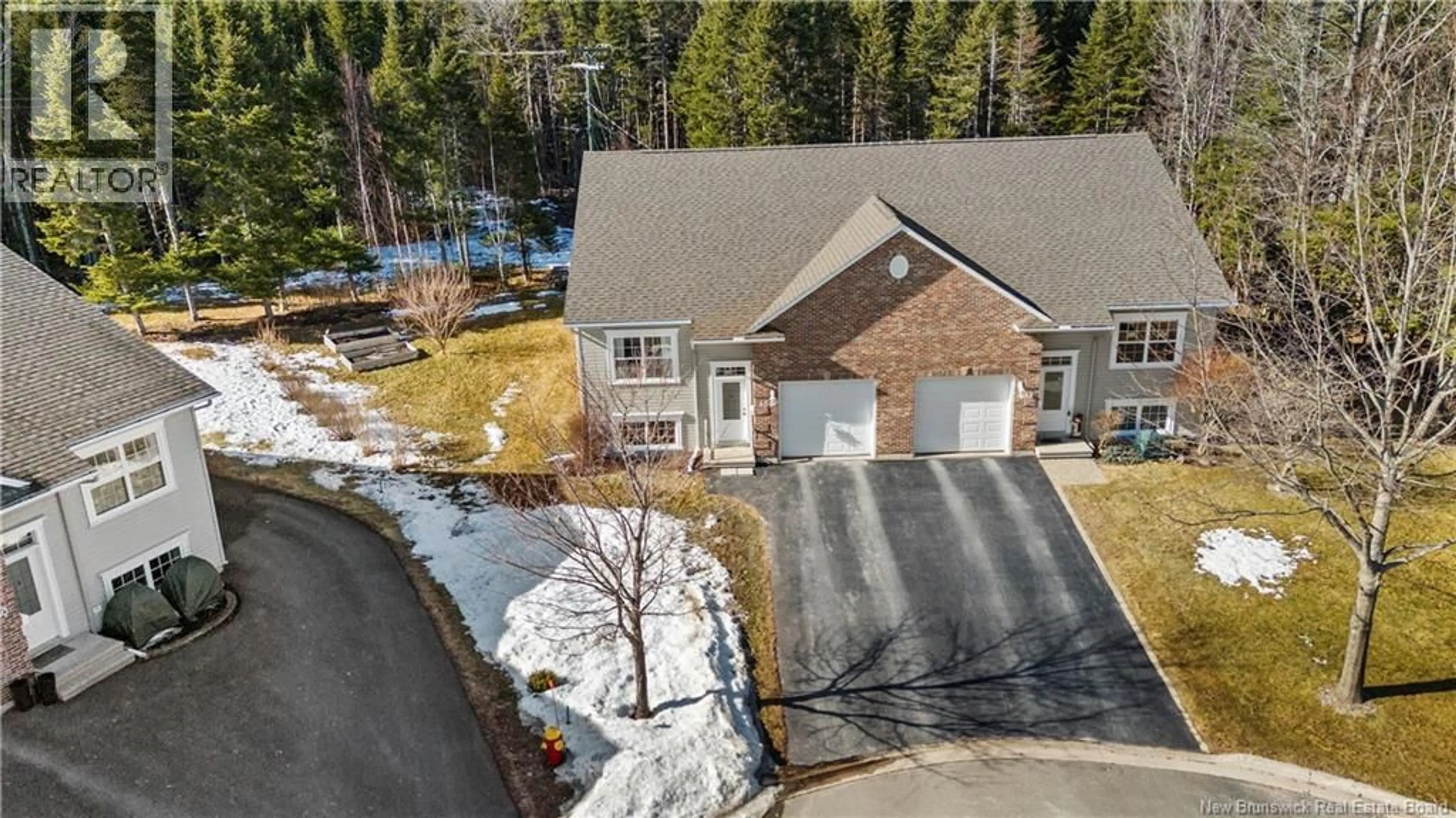 A pic from outside/outdoor area/front of a property/back of a property/a pic from drone, street for 46 MILLRIDGE LANE, Marysville New Brunswick E3A0S7