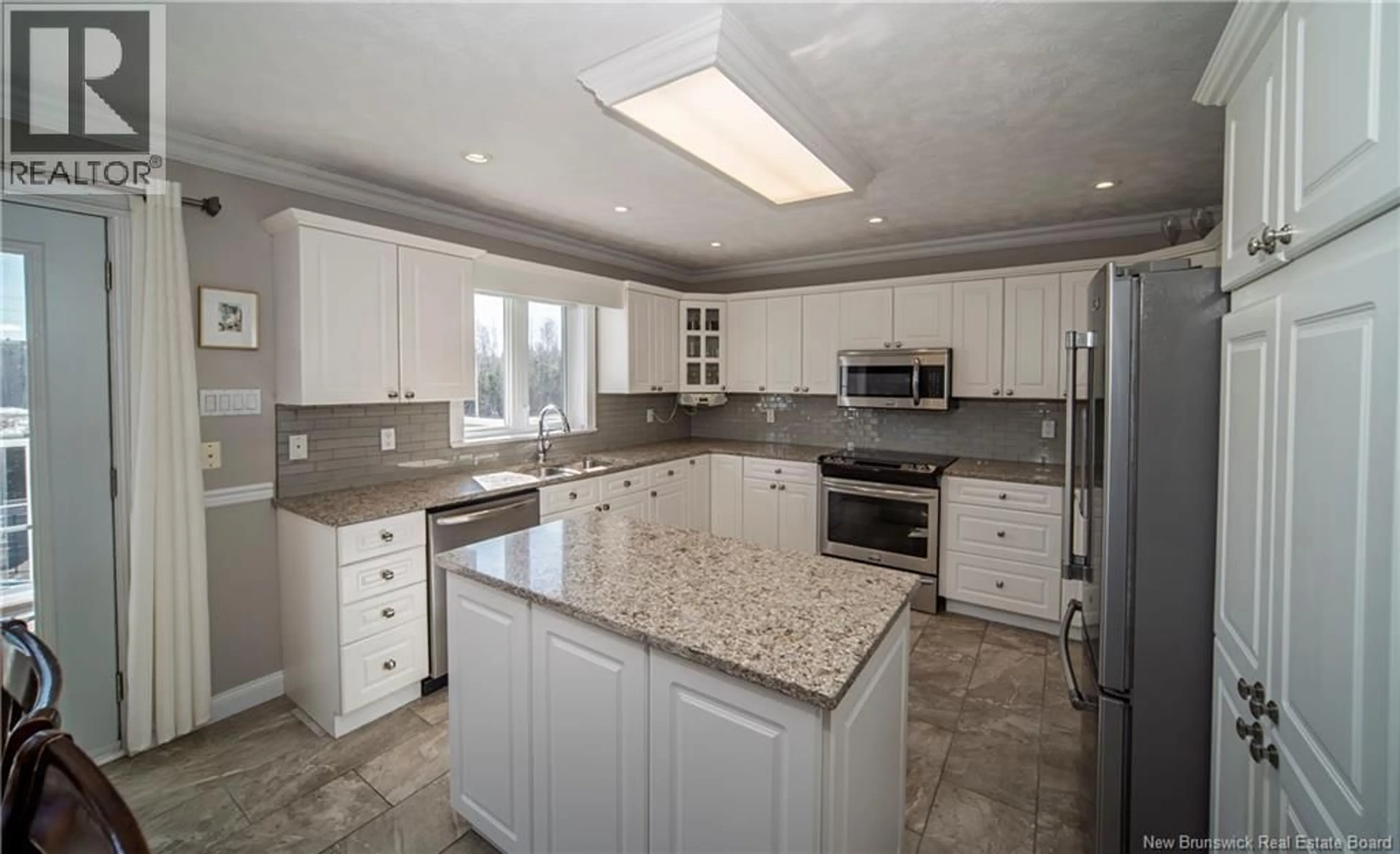 Open concept kitchen, ceramic/tile floor for 100 DUFFIE DRIVE, Oromocto New Brunswick E2V4L3