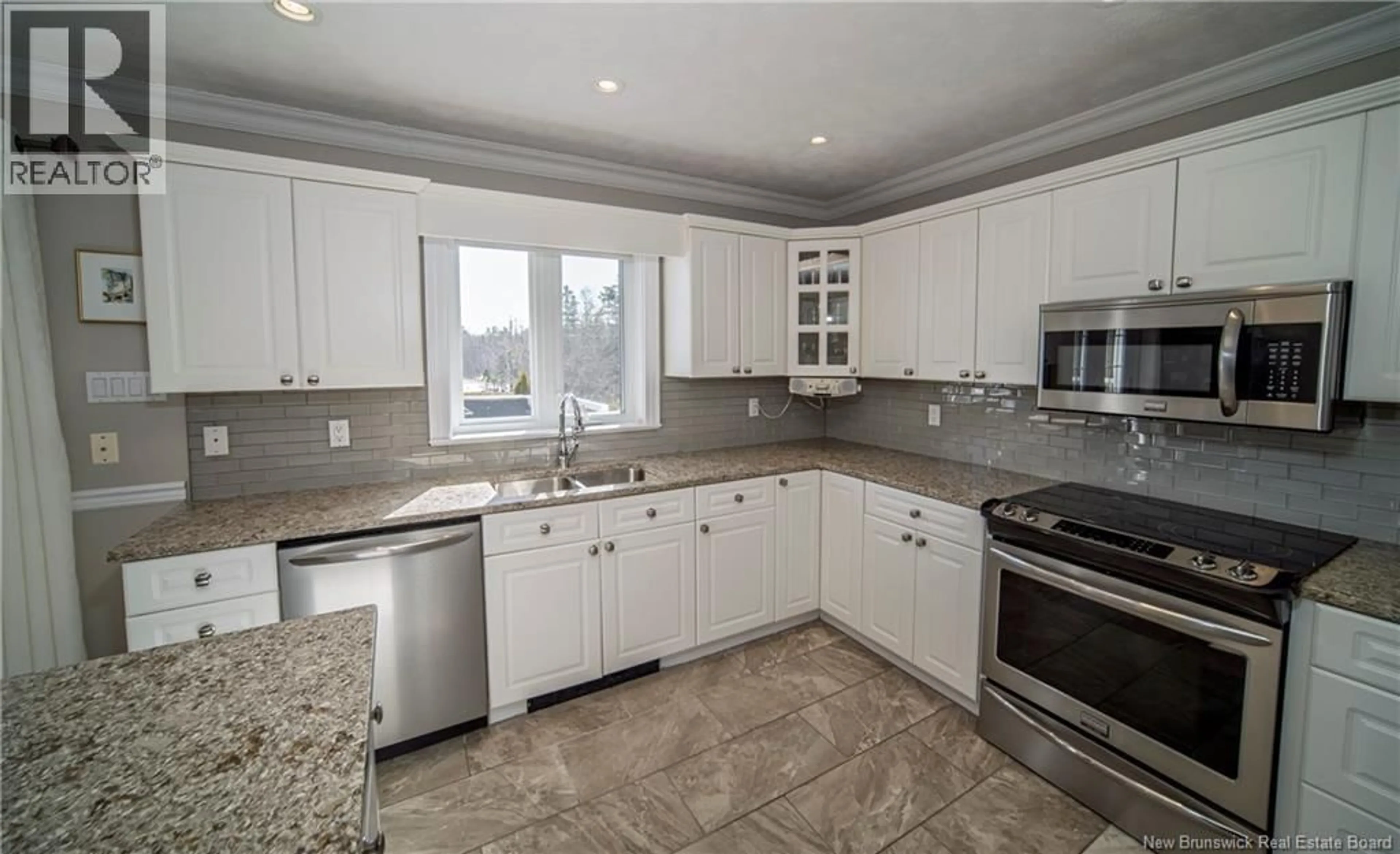 Open concept kitchen, ceramic/tile floor for 100 DUFFIE DRIVE, Oromocto New Brunswick E2V4L3