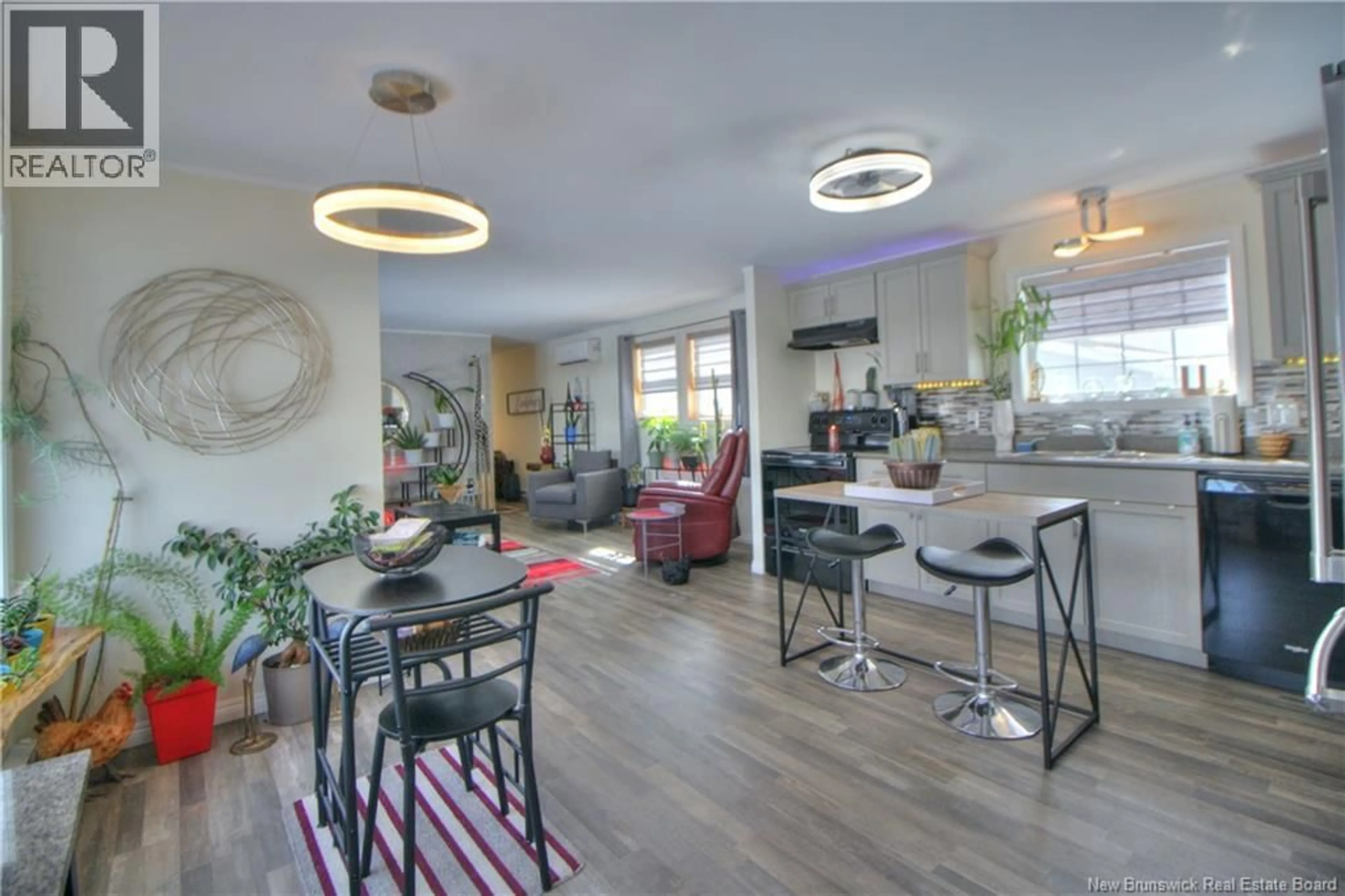 Open concept kitchen, wood/laminate floor for 22 PERILLA, Moncton New Brunswick E1H2Z2