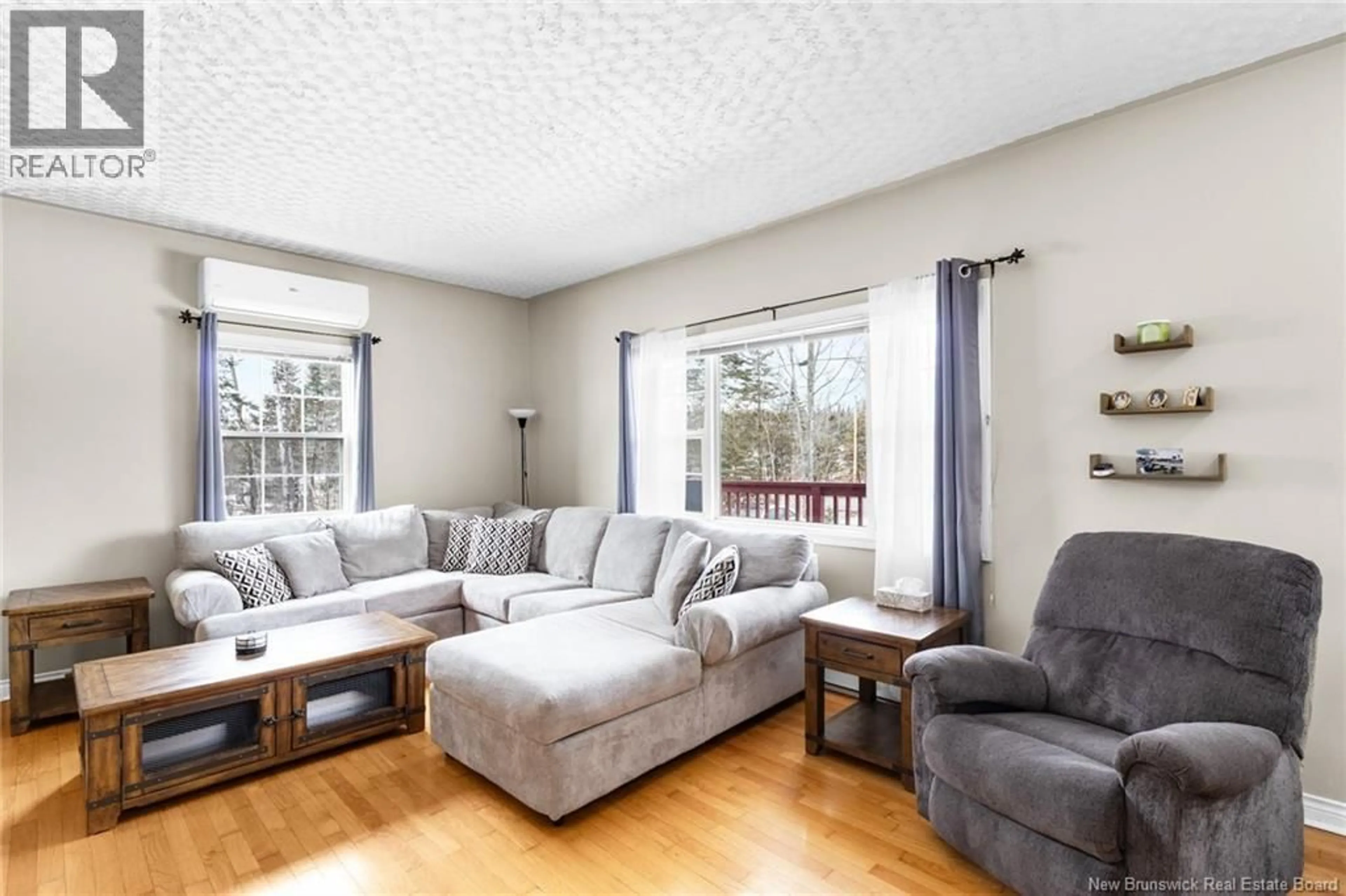 Living room with furniture, wood/laminate floor for 1321 ROUTE 655, Rusagonis New Brunswick E3B8Z9