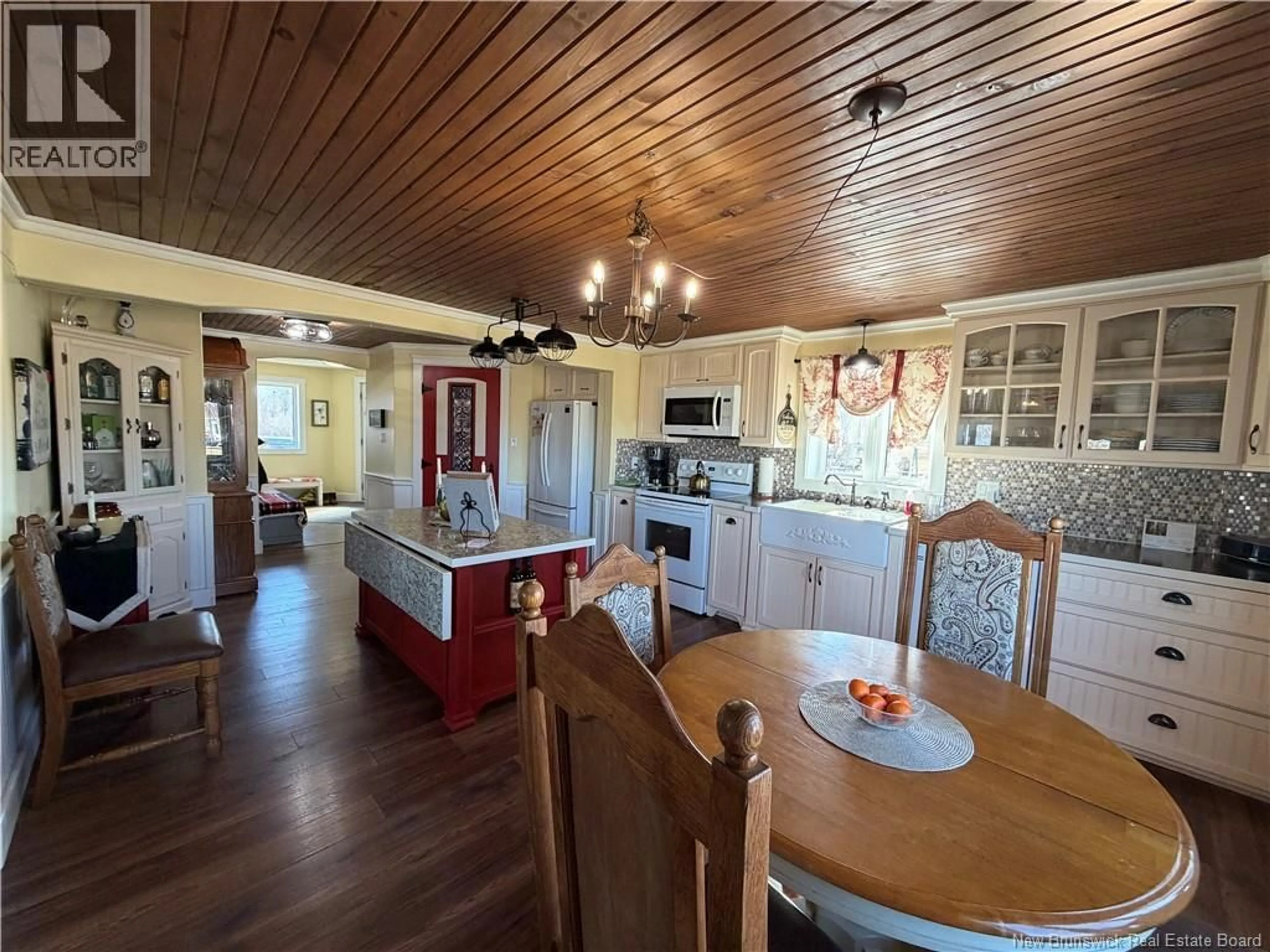 Open concept kitchen, wood/laminate floor for 4993 ROUTE 117 HWY, Escuminac New Brunswick E9A1R4