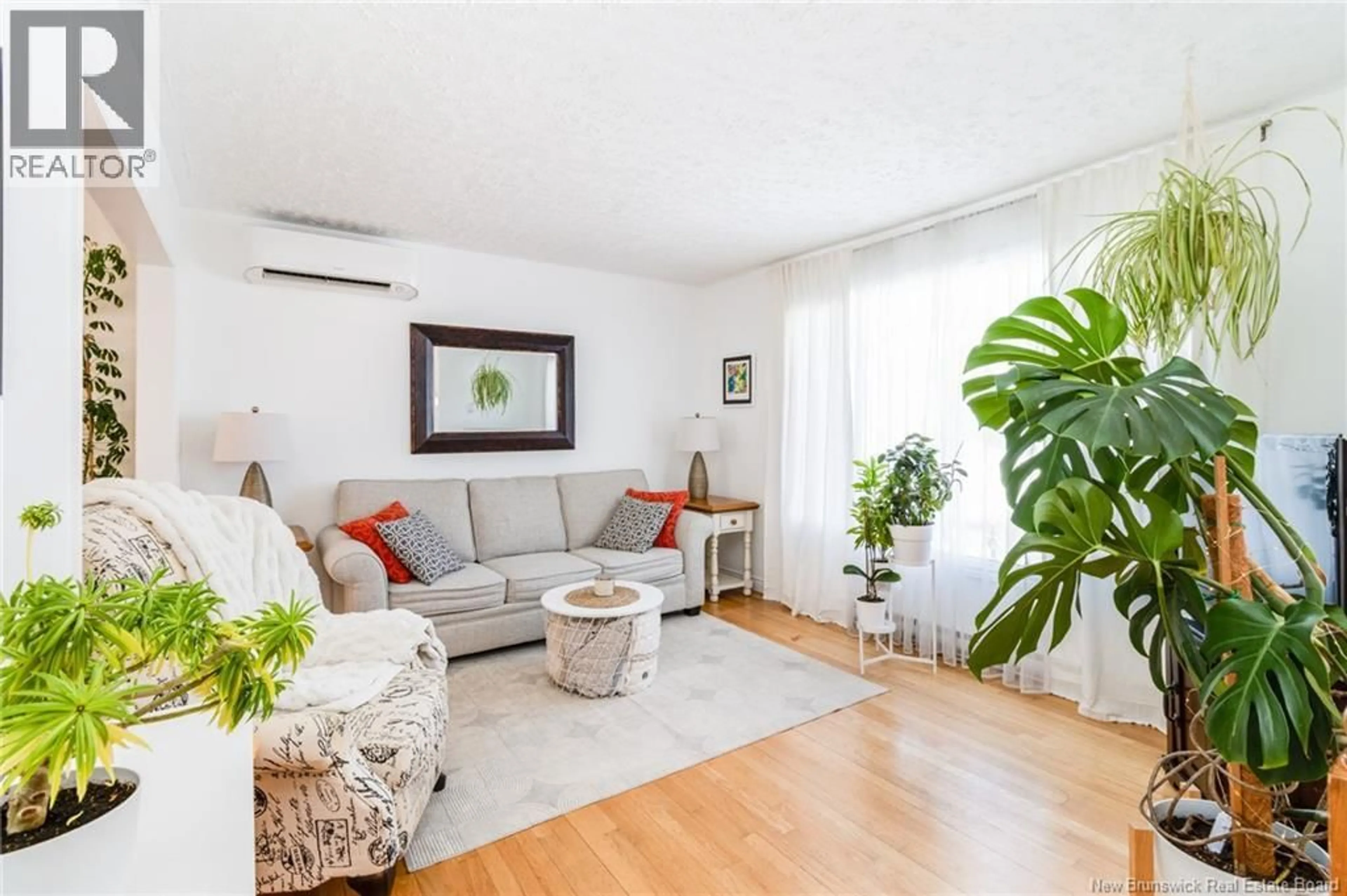 Living room with furniture, unknown for 19 MOOERS DRIVE, Fredericton New Brunswick E3C1K9