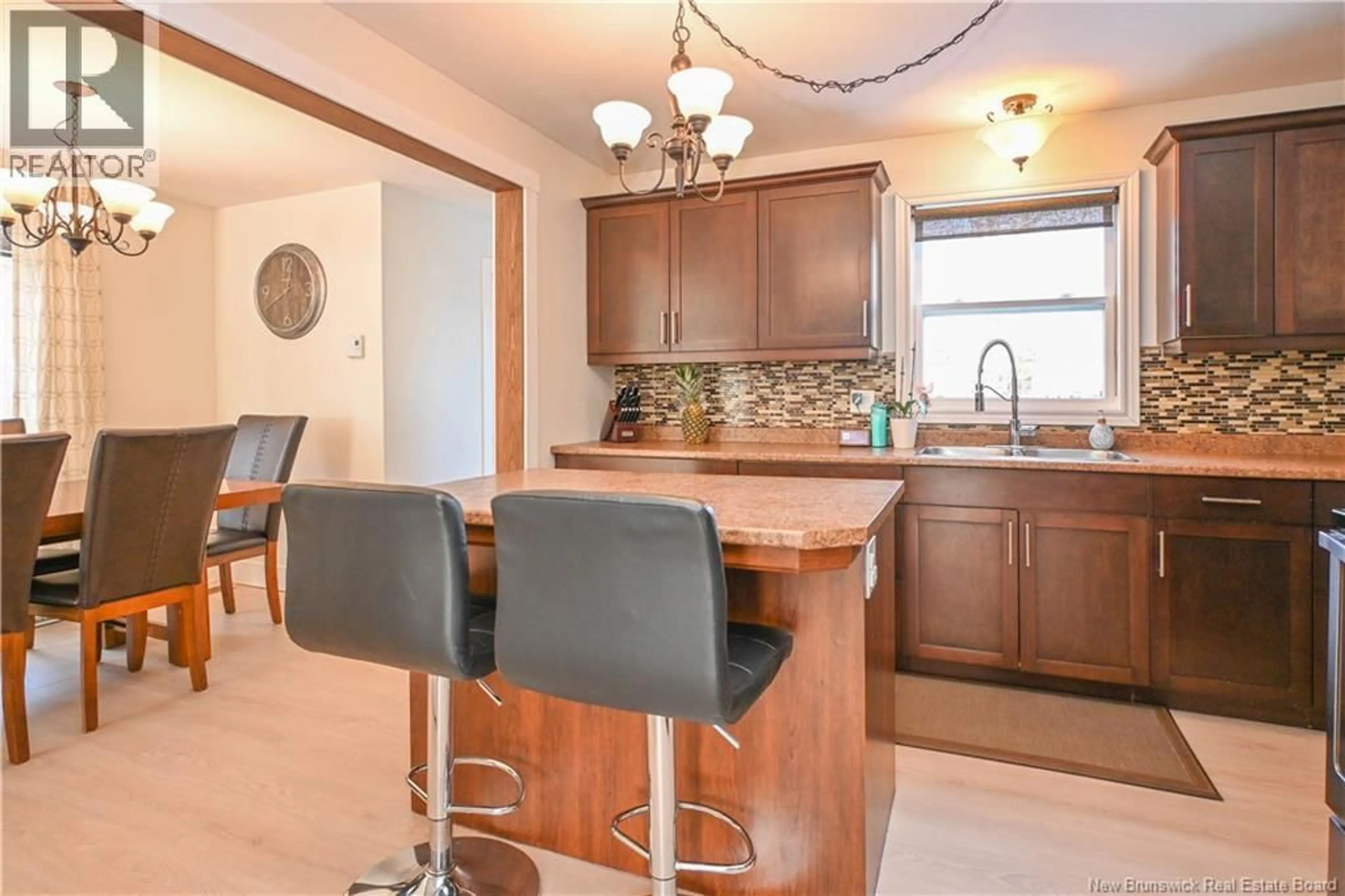 Open concept kitchen, ceramic/tile floor for 497 RUE DE L'EGLISE, Tracadie New Brunswick E1X1B1