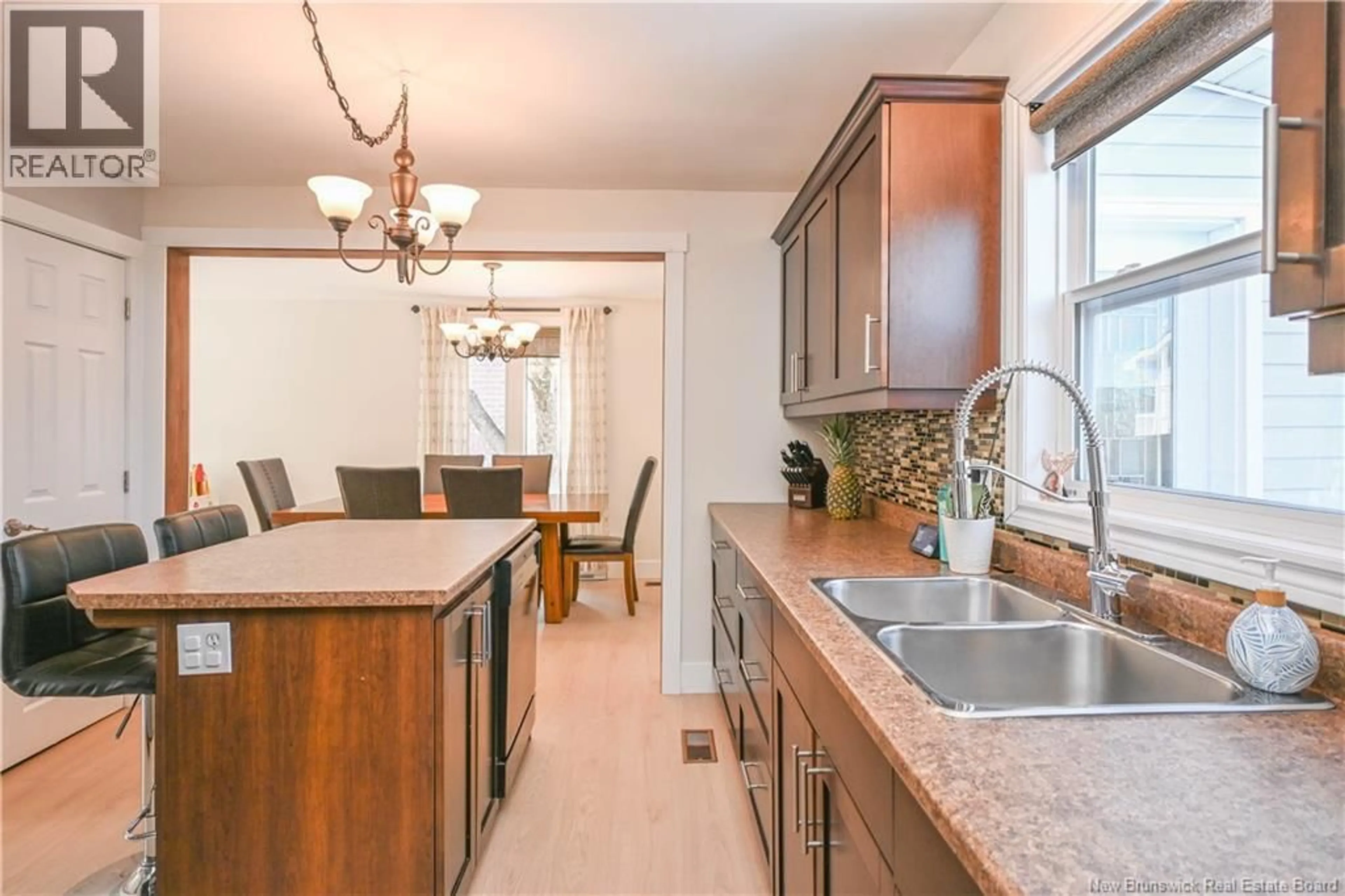 Open concept kitchen, unknown for 497 RUE DE L'EGLISE, Tracadie New Brunswick E1X1B1