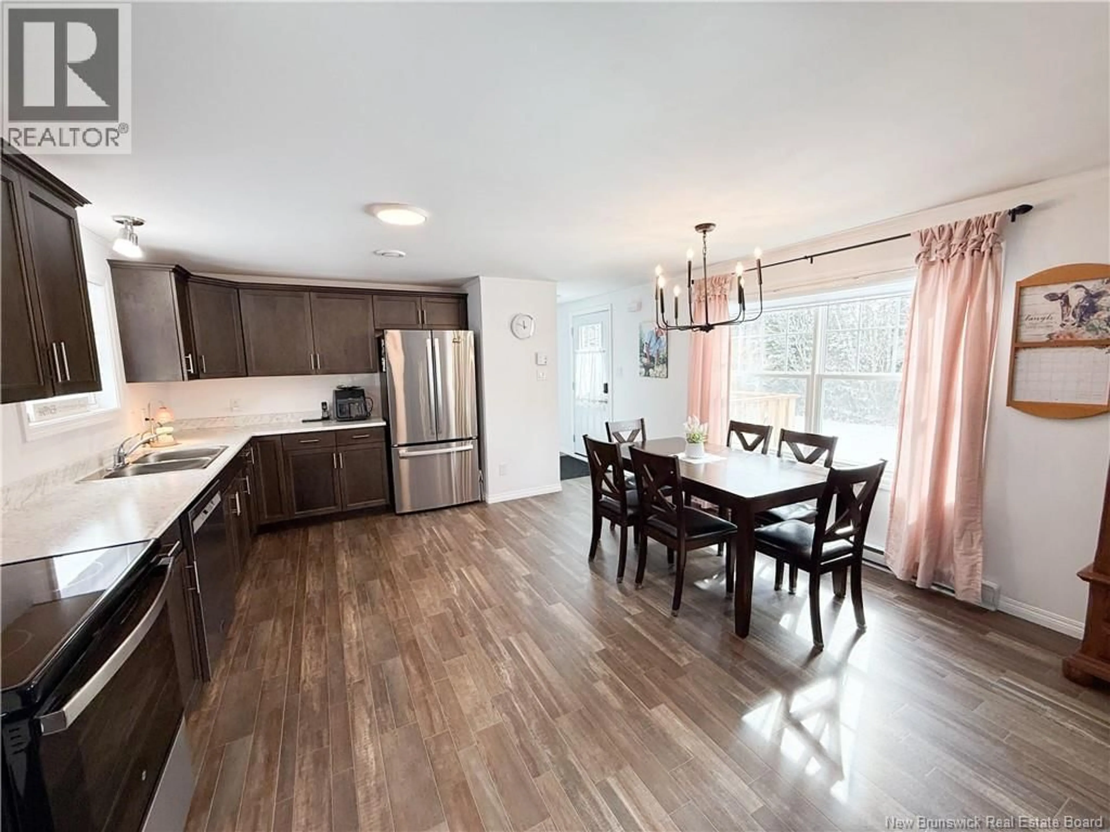 Open concept kitchen, wood/laminate floor for 36 ORCHARD CRESCENT, Picadilly New Brunswick E4E3X6