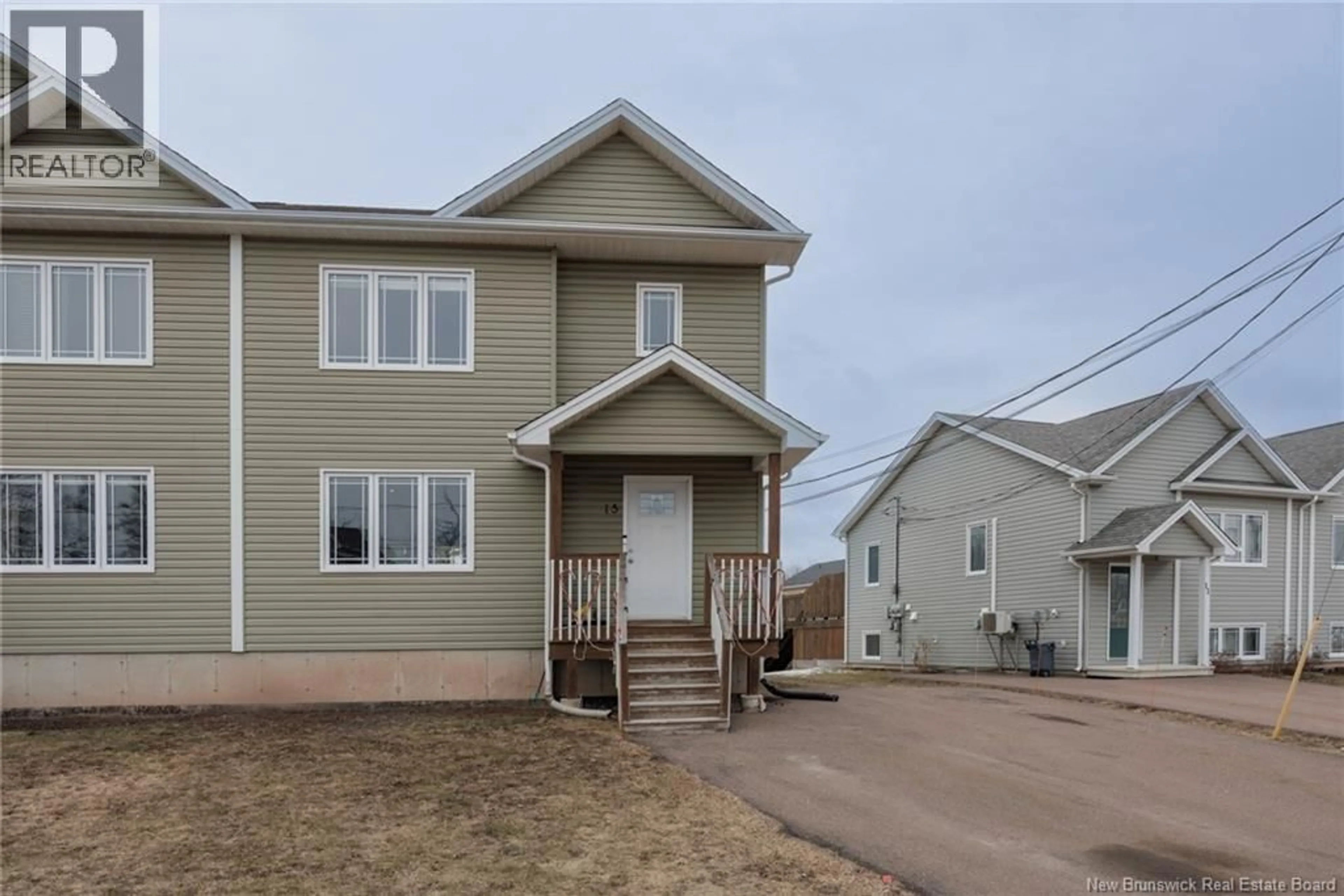 Home with vinyl exterior material, street for 15 JANICK COURT, Moncton New Brunswick E1A9L6