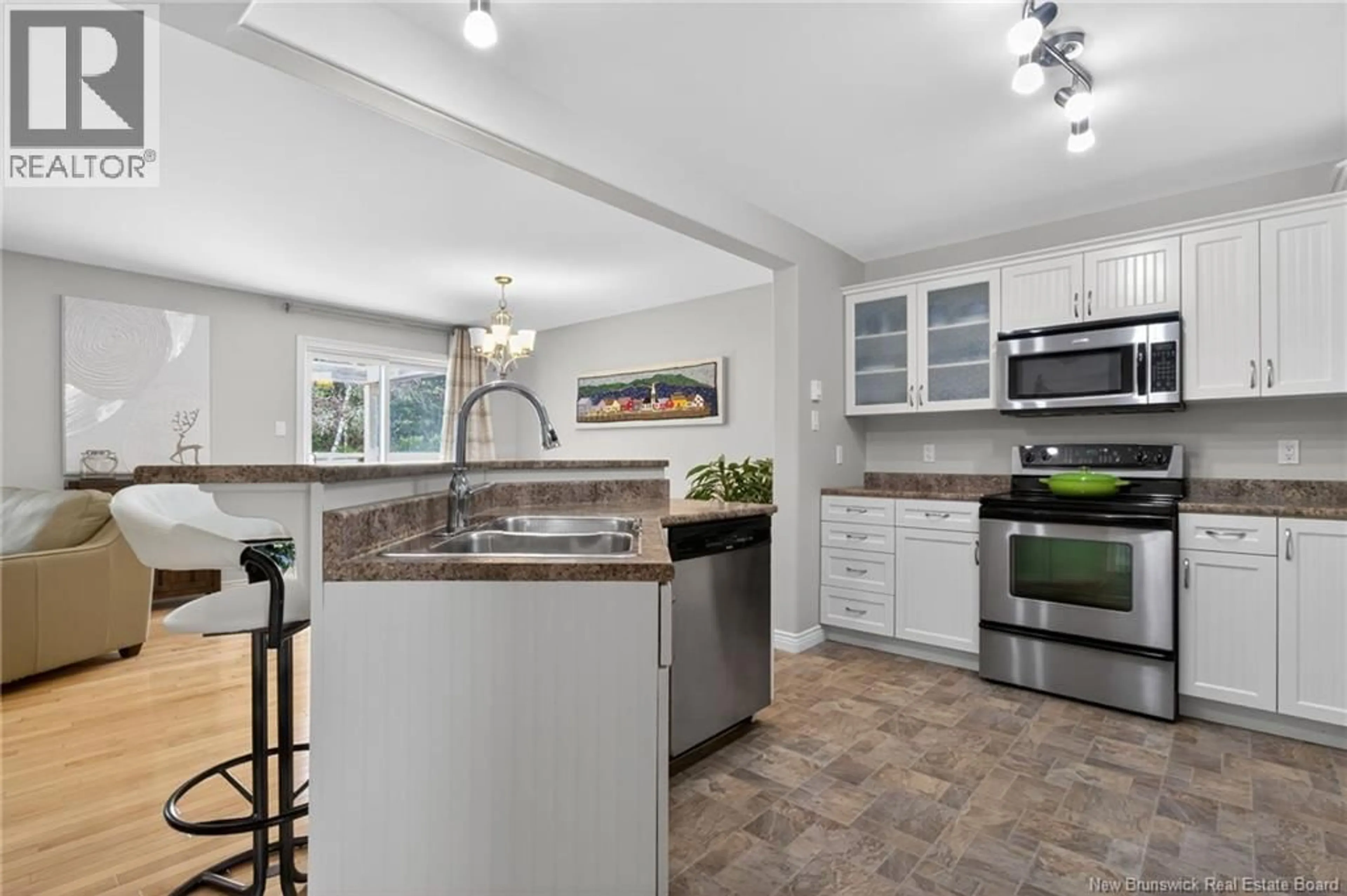 Open concept kitchen, ceramic/tile floor for 208 DAMIEN STREET, Dieppe New Brunswick E1A5V6