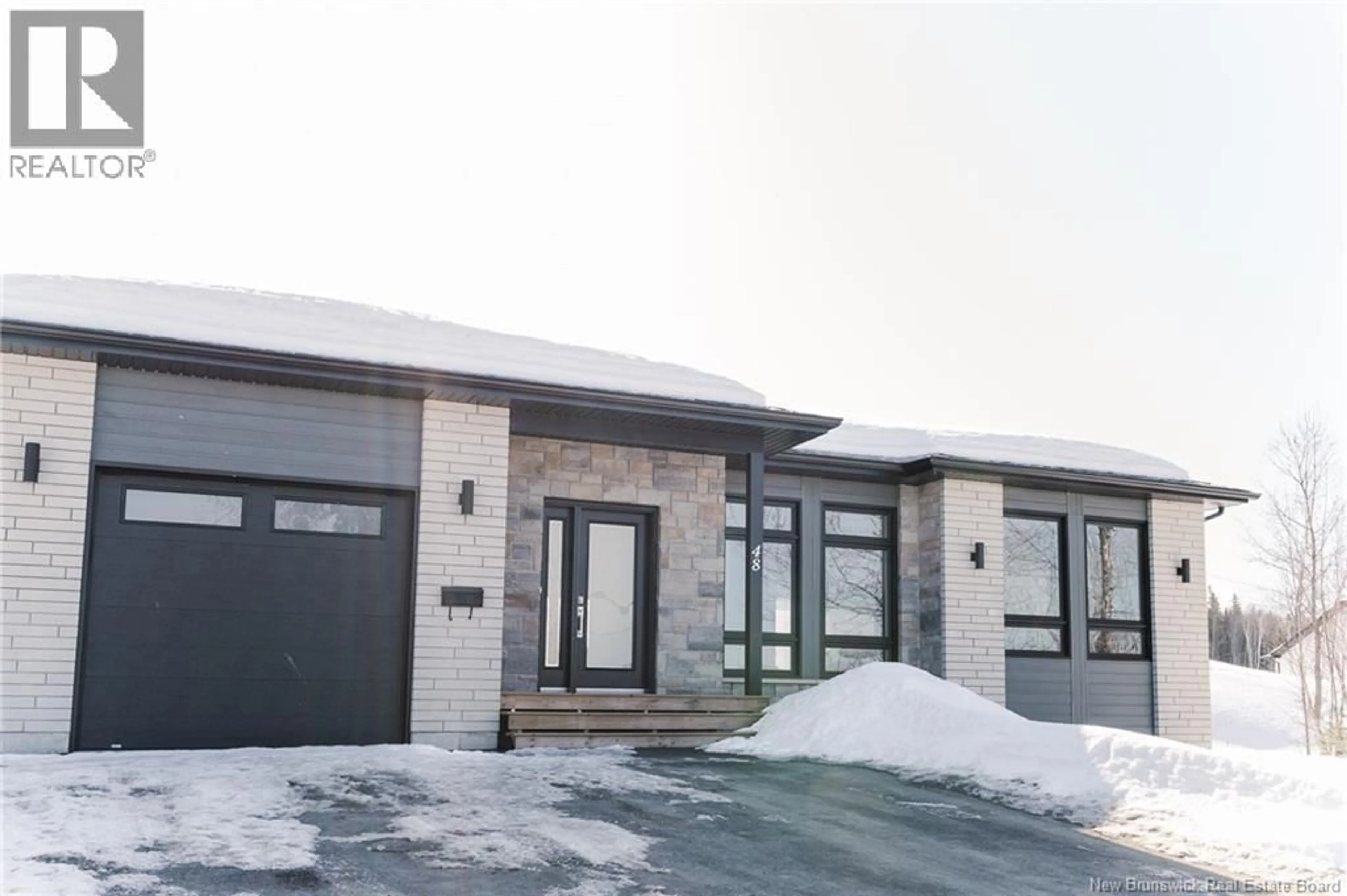 Home with brick exterior material, street for 48 MGR-ROY AVENUE, Edmundston New Brunswick E3V4G4