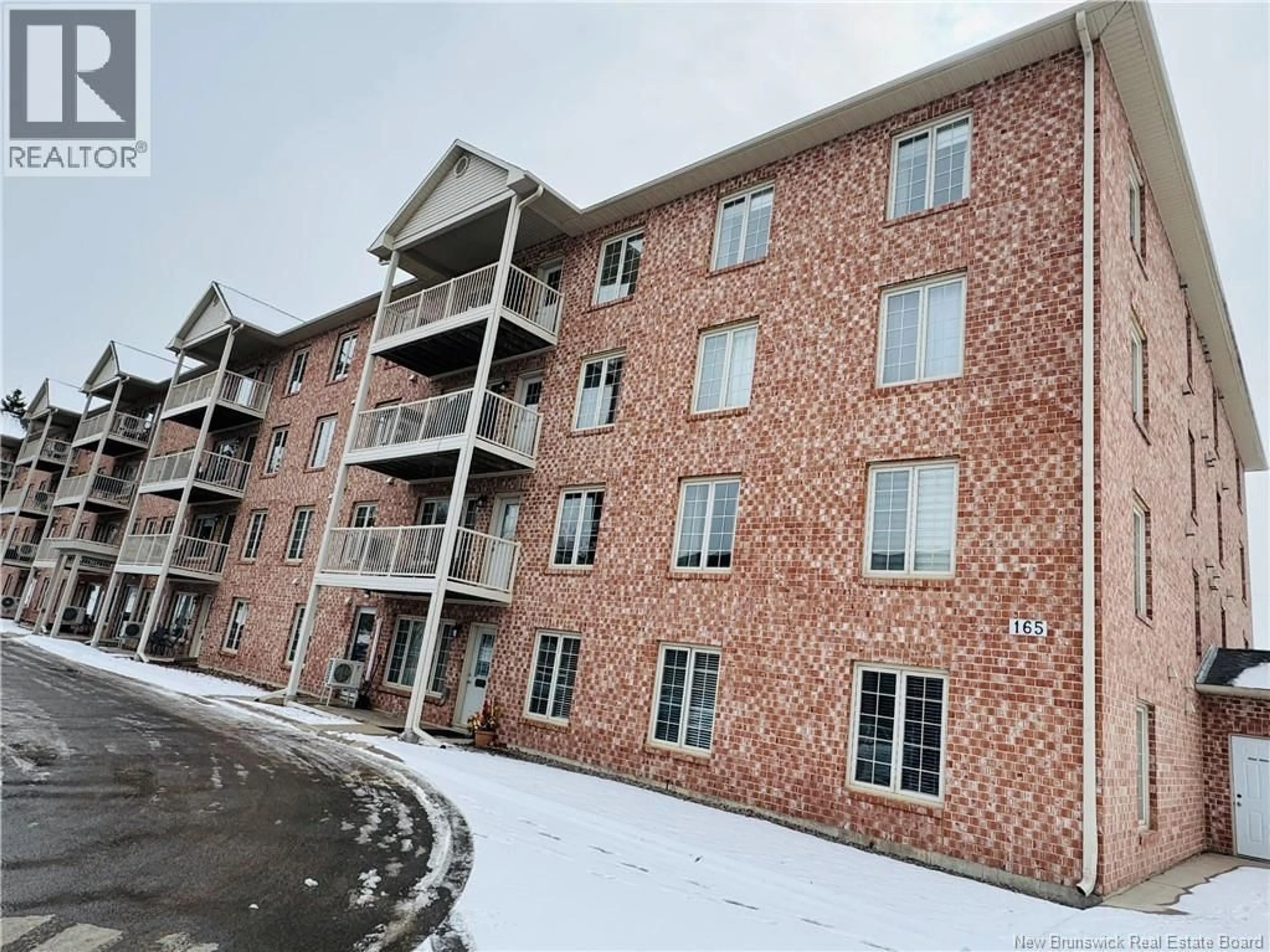 A pic from outside/outdoor area/front of a property/back of a property/a pic from drone, building for 105 - 165 VALCOUR DRIVE, Fredericton New Brunswick E3C0H5