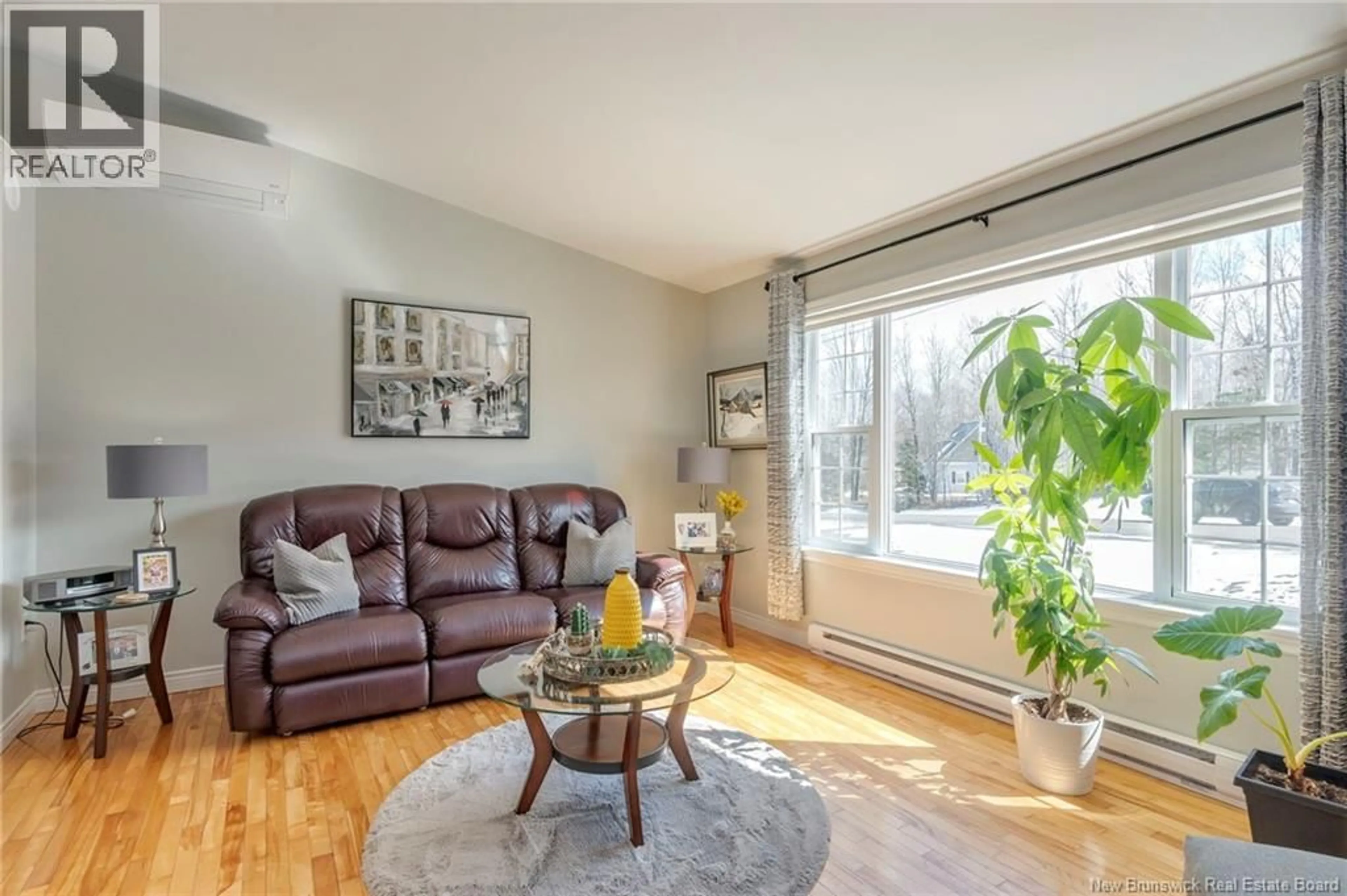 Living room with furniture, wood/laminate floor for 42 RAYMOND STREET, Hampton New Brunswick E5N5J8