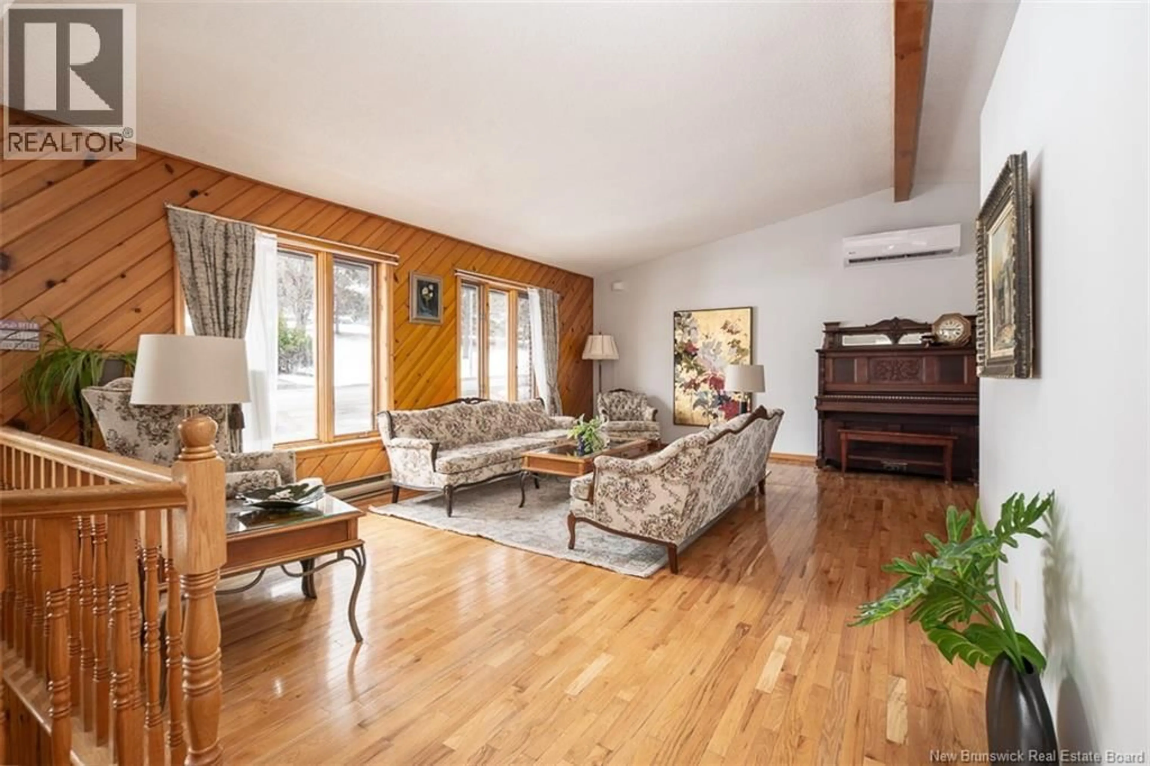 Living room with furniture, wood/laminate floor for 340 MACDONALD AVENUE, Oromocto New Brunswick E2V2J3