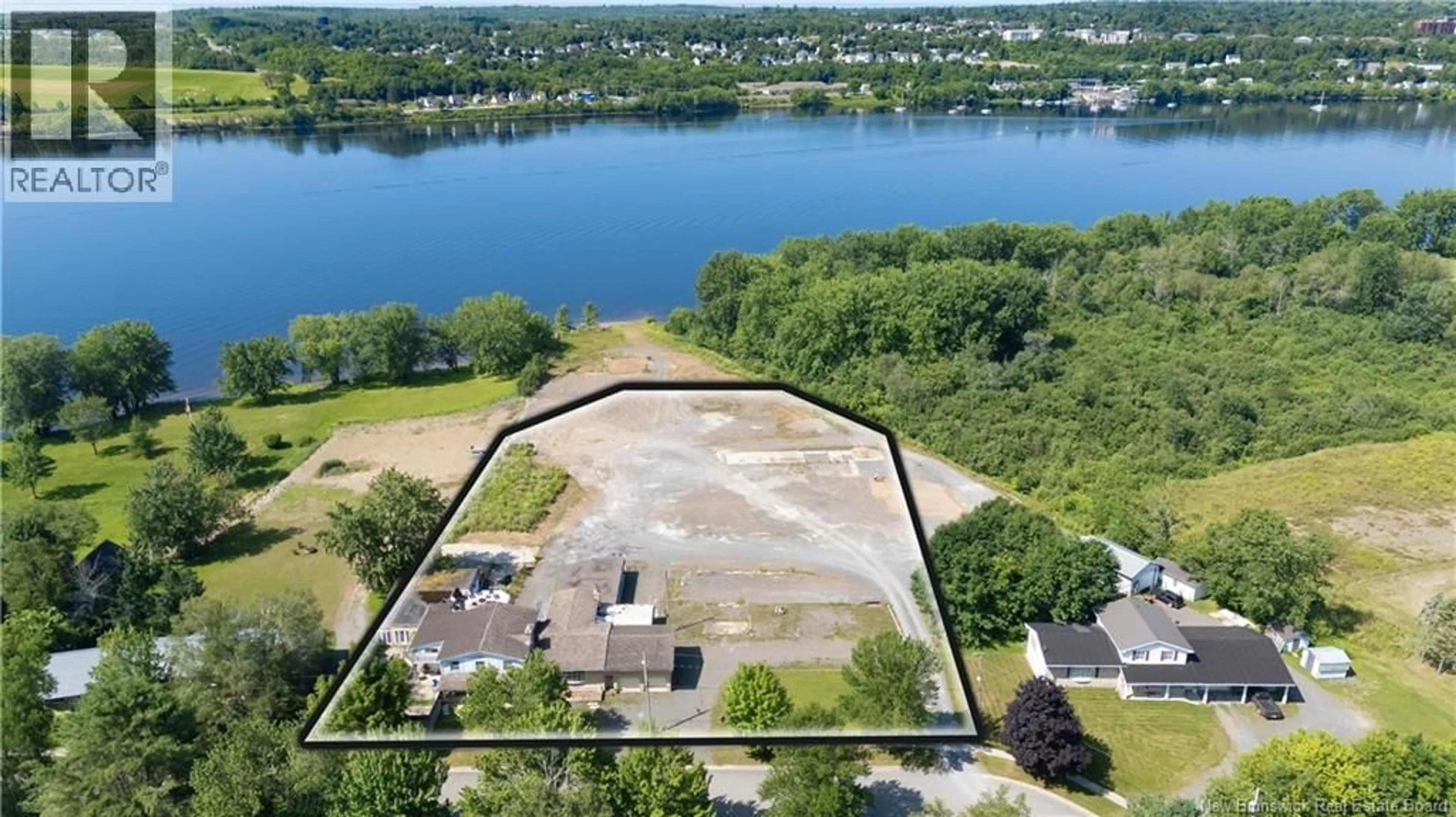 A pic from outside/outdoor area/front of a property/back of a property/a pic from drone, water/lake/river/ocean view for 59-69 ROSS TERRACE, Fredericton New Brunswick W3A8E5