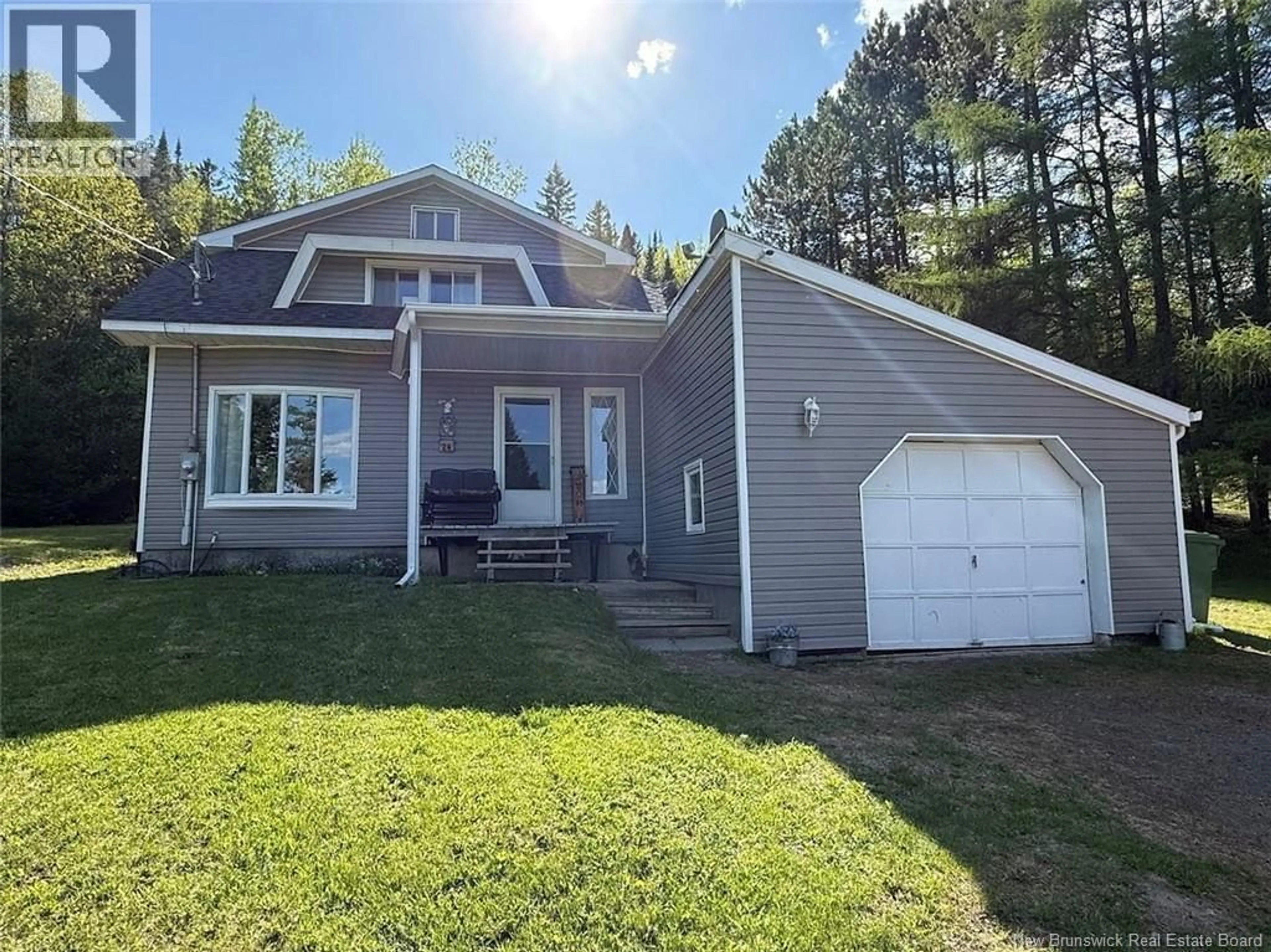 Home with vinyl exterior material, street for 24 RANG 8 ROAD, Edmundston New Brunswick E7B2P8