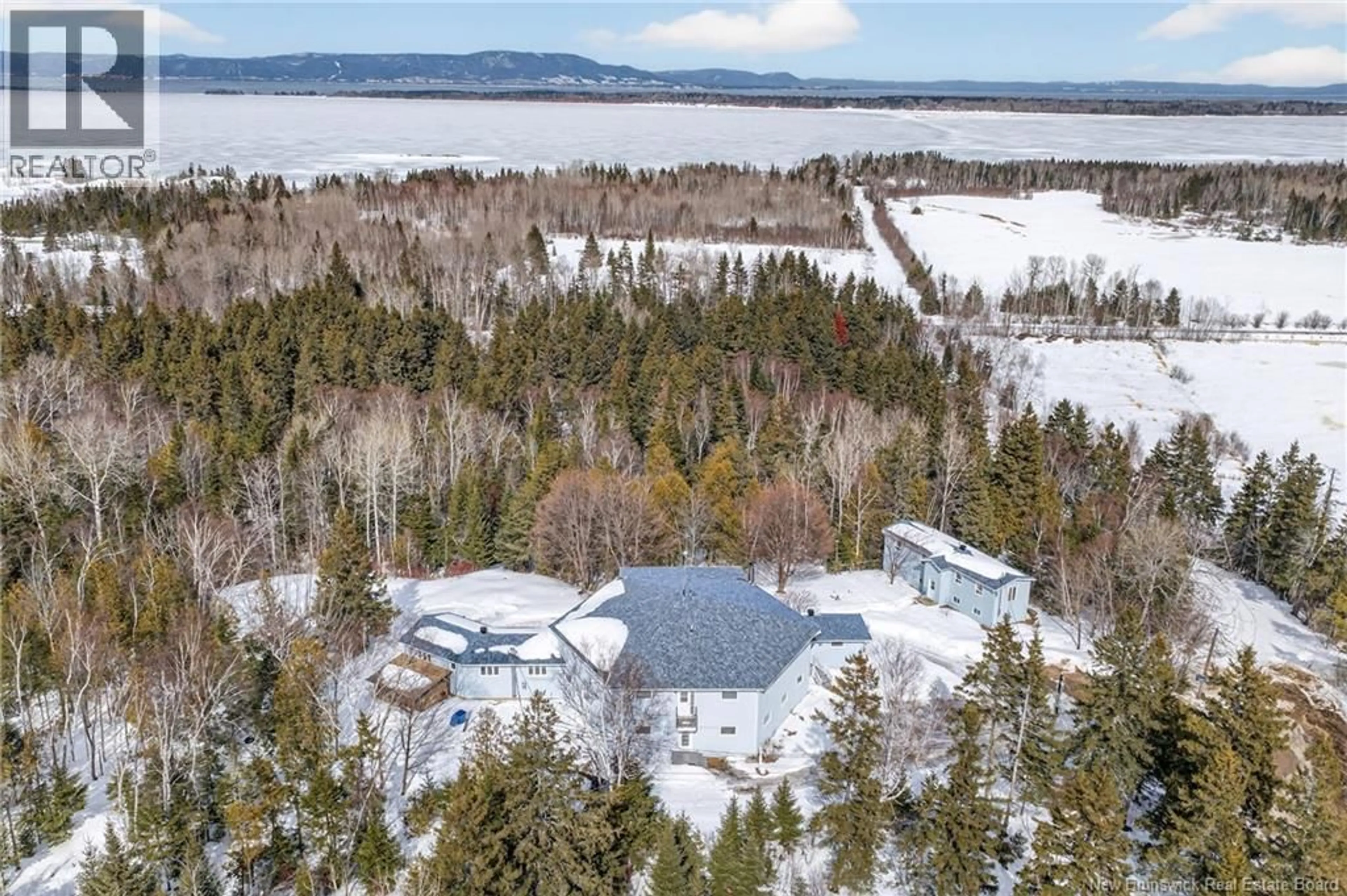 A pic from outside/outdoor area/front of a property/back of a property/a pic from drone, water/lake/river/ocean view for 15 BENJAMIN PORTAGE NORTH, Benjamin River New Brunswick E8G1N9