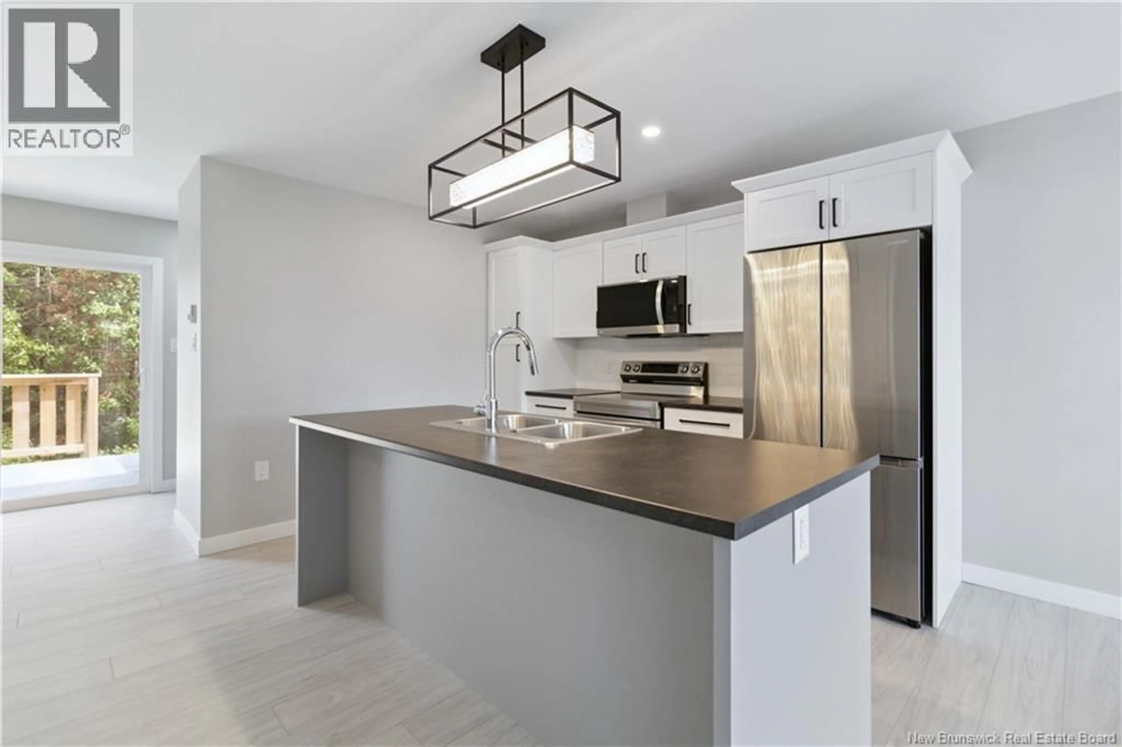 Open concept kitchen, ceramic/tile floor for 378 DAMIEN, Dieppe New Brunswick E1A0H3