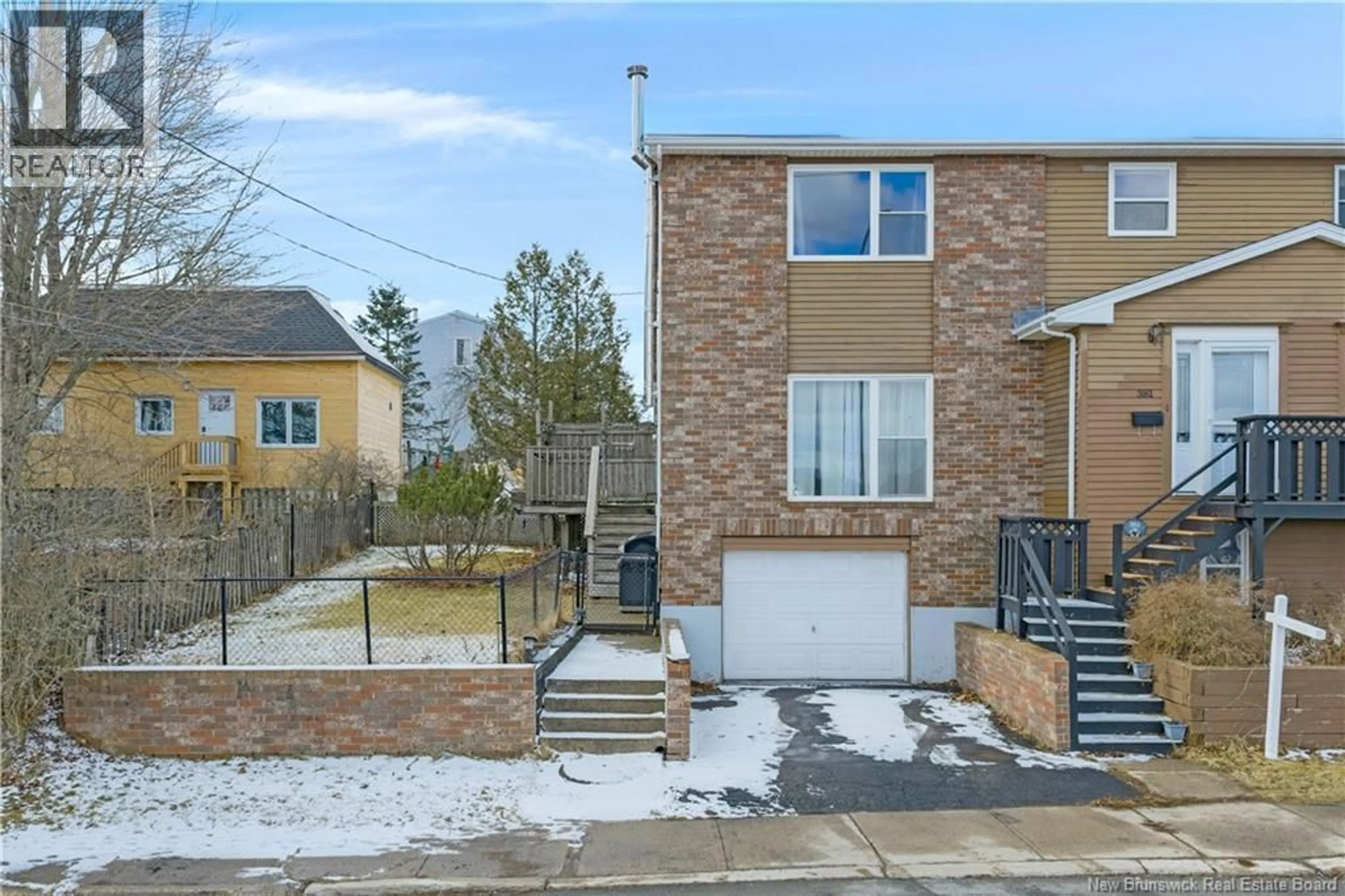 A pic from outside/outdoor area/front of a property/back of a property/a pic from drone, street for 381 LANCASTER STREET, Saint John New Brunswick E2M2L3