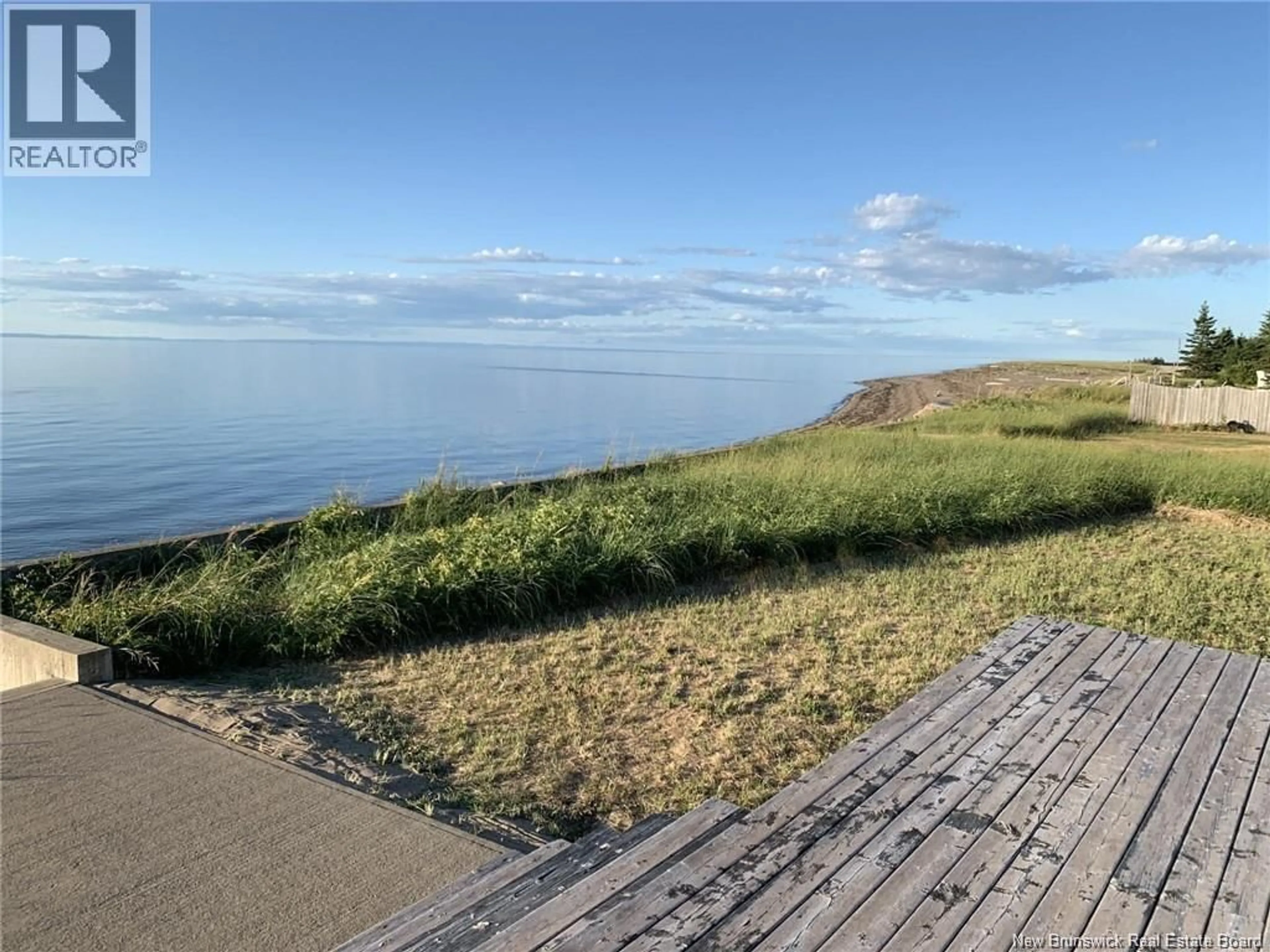 A pic from outside/outdoor area/front of a property/back of a property/a pic from drone, water/lake/river/ocean view for 345 BAYSHORE DRIVE, Bathurst New Brunswick E2A6A5