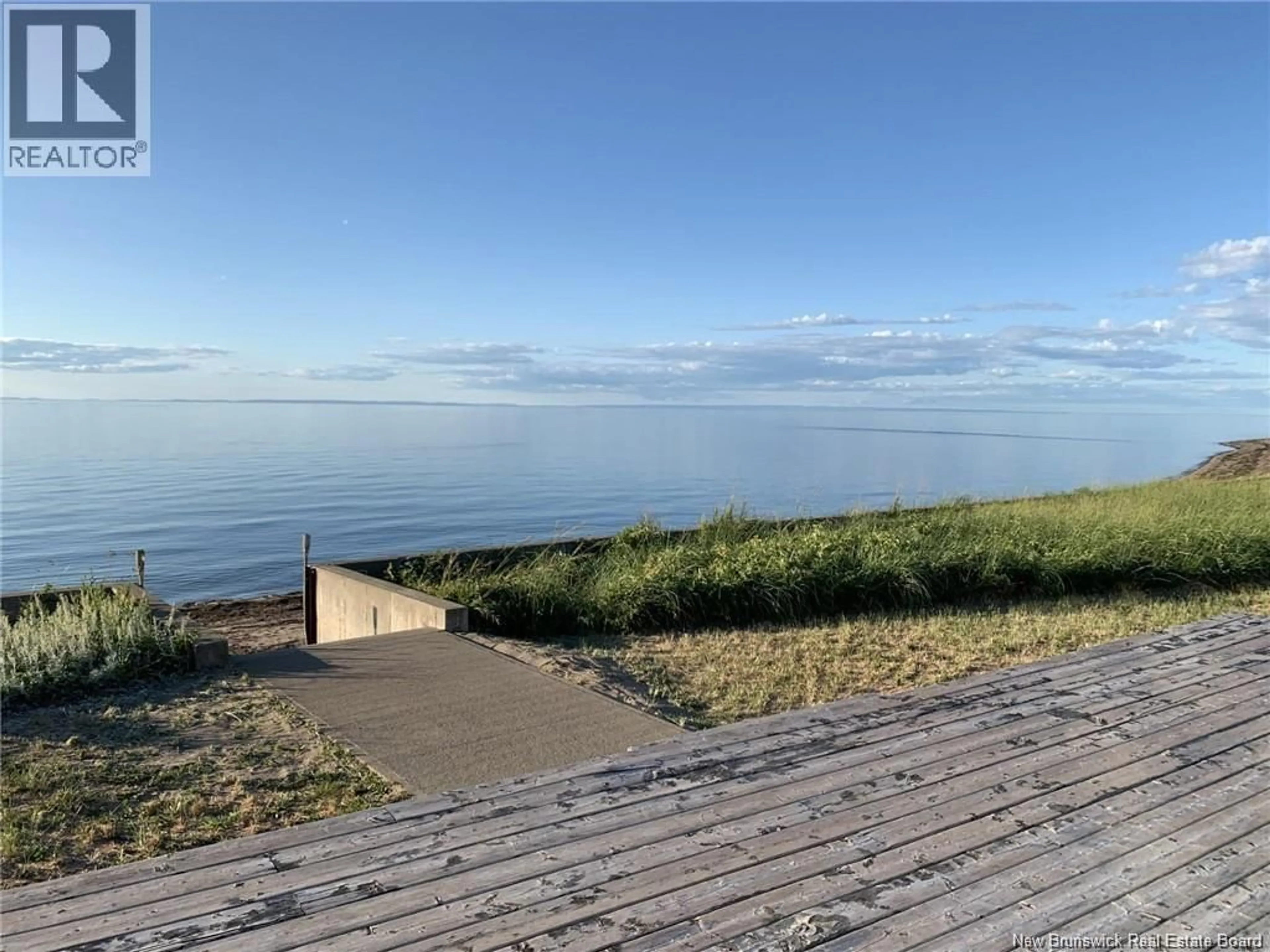 A pic from outside/outdoor area/front of a property/back of a property/a pic from drone, water/lake/river/ocean view for 345 BAYSHORE DRIVE, Bathurst New Brunswick E2A6A5