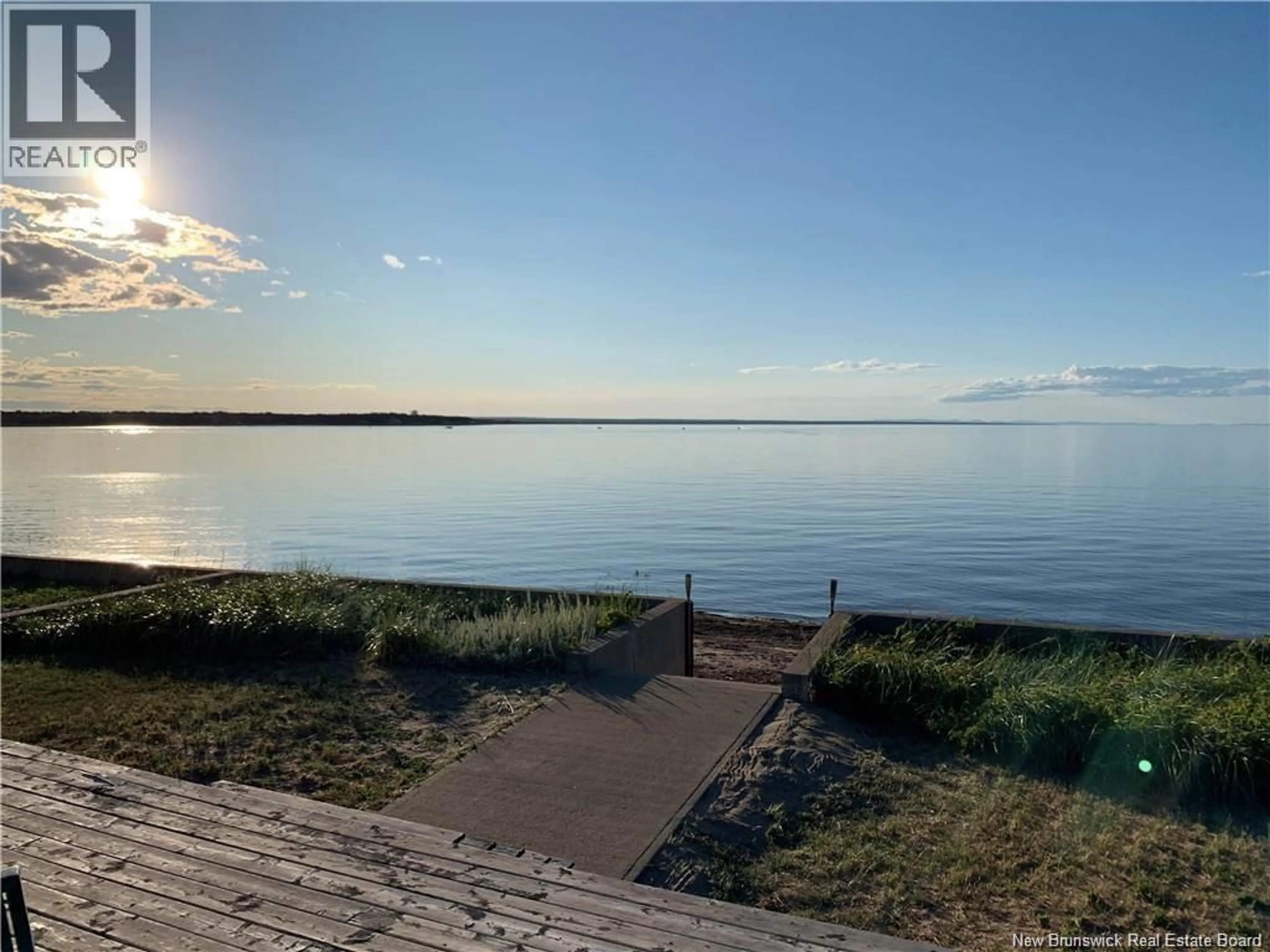 A pic from outside/outdoor area/front of a property/back of a property/a pic from drone, water/lake/river/ocean view for 345 BAYSHORE DRIVE, Bathurst New Brunswick E2A6A5