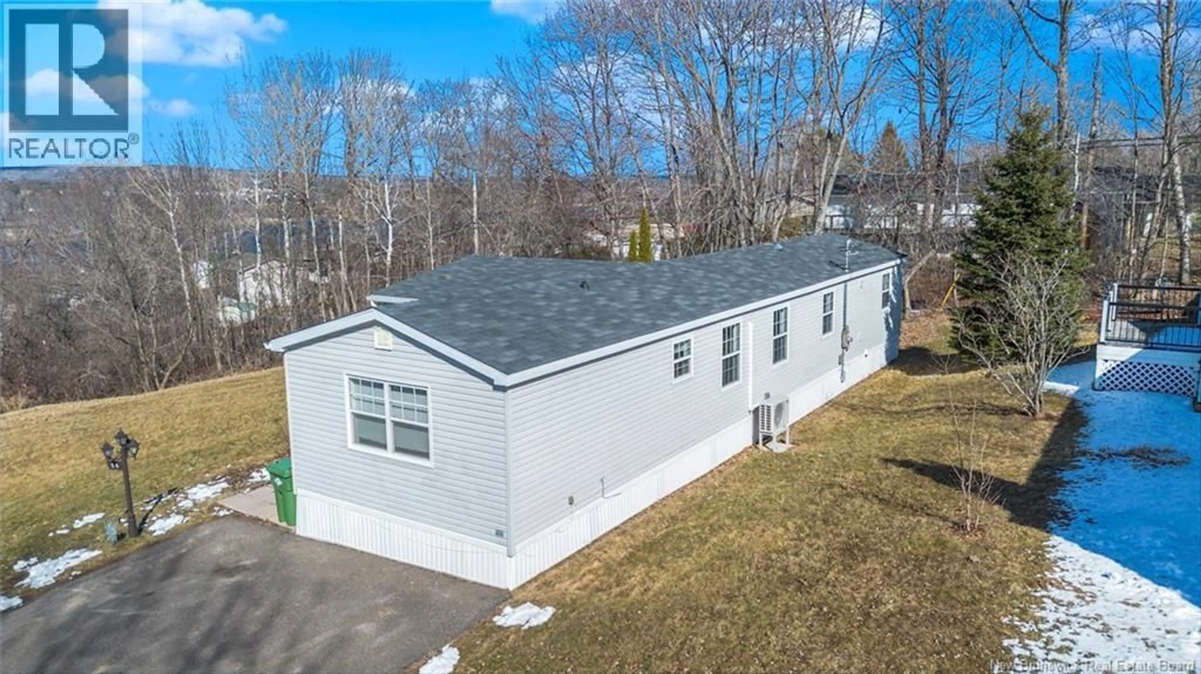 A pic from outside/outdoor area/front of a property/back of a property/a pic from drone, unknown for 56 MACINTOSH STREET, Fredericton New Brunswick E3C2M9