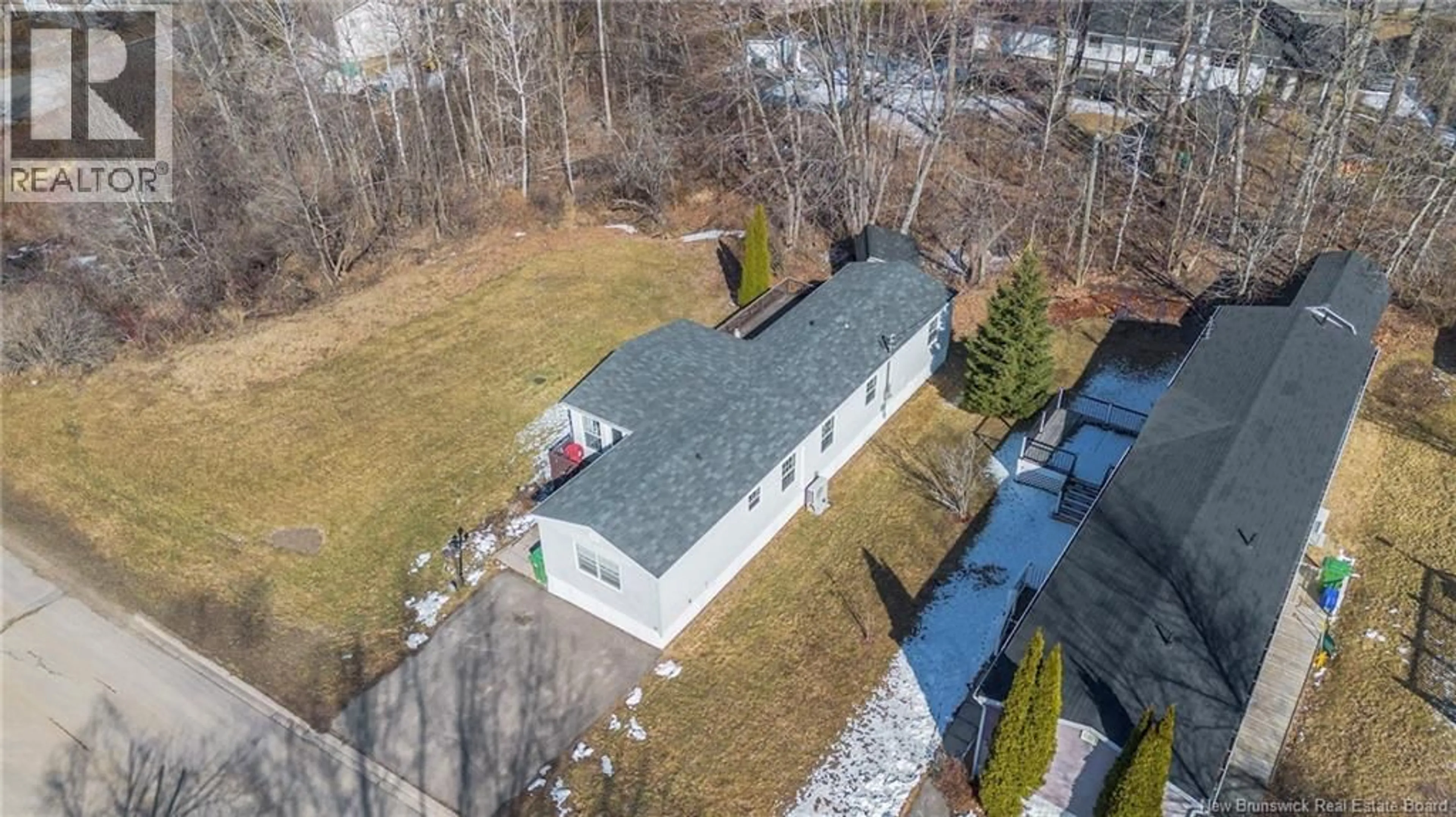 A pic from outside/outdoor area/front of a property/back of a property/a pic from drone, street for 56 MACINTOSH STREET, Fredericton New Brunswick E3C2M9