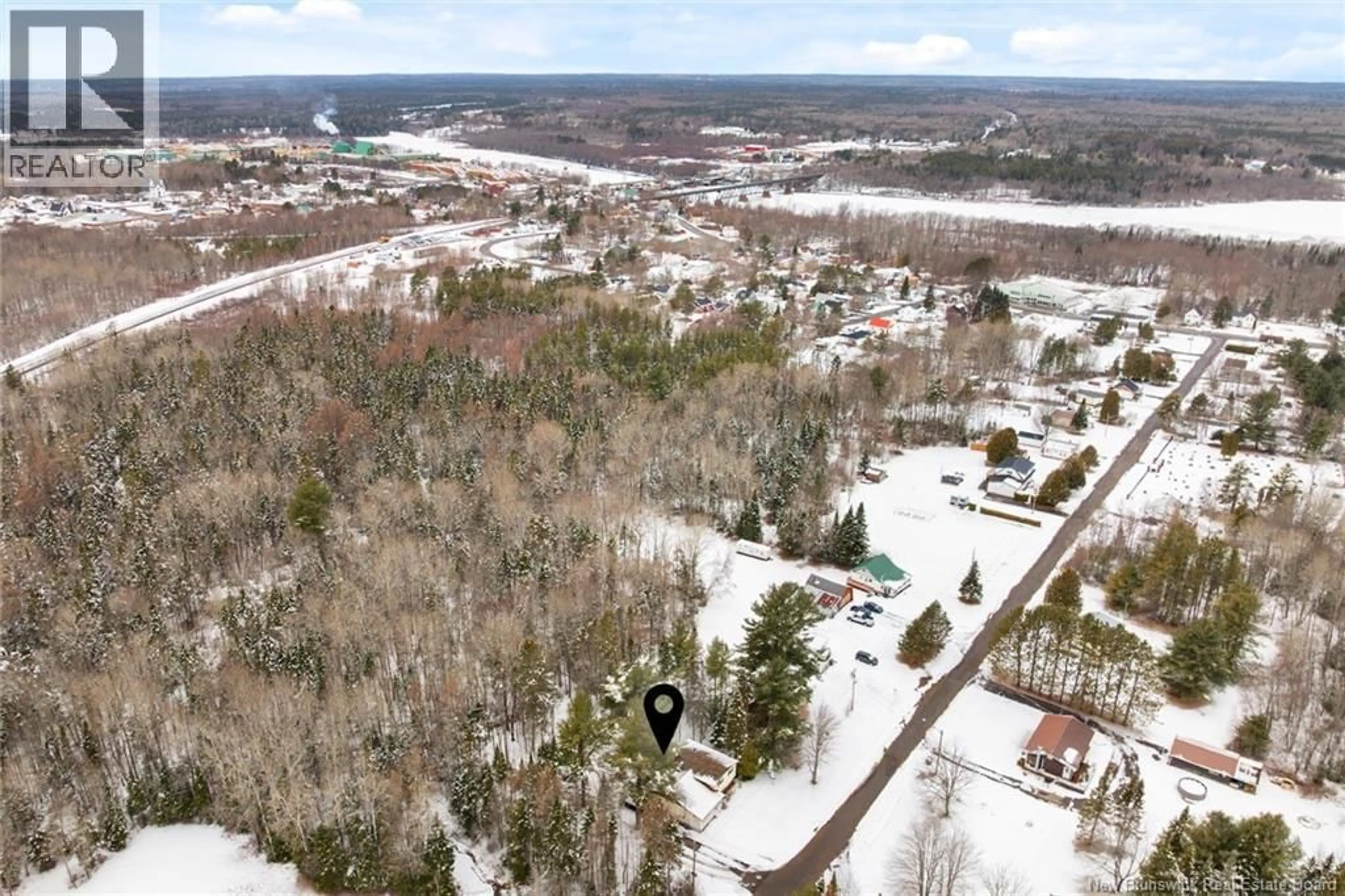 A pic from outside/outdoor area/front of a property/back of a property/a pic from drone, forest/trees view for 64 MAPLE STREET, Chipman New Brunswick E4A1Y7
