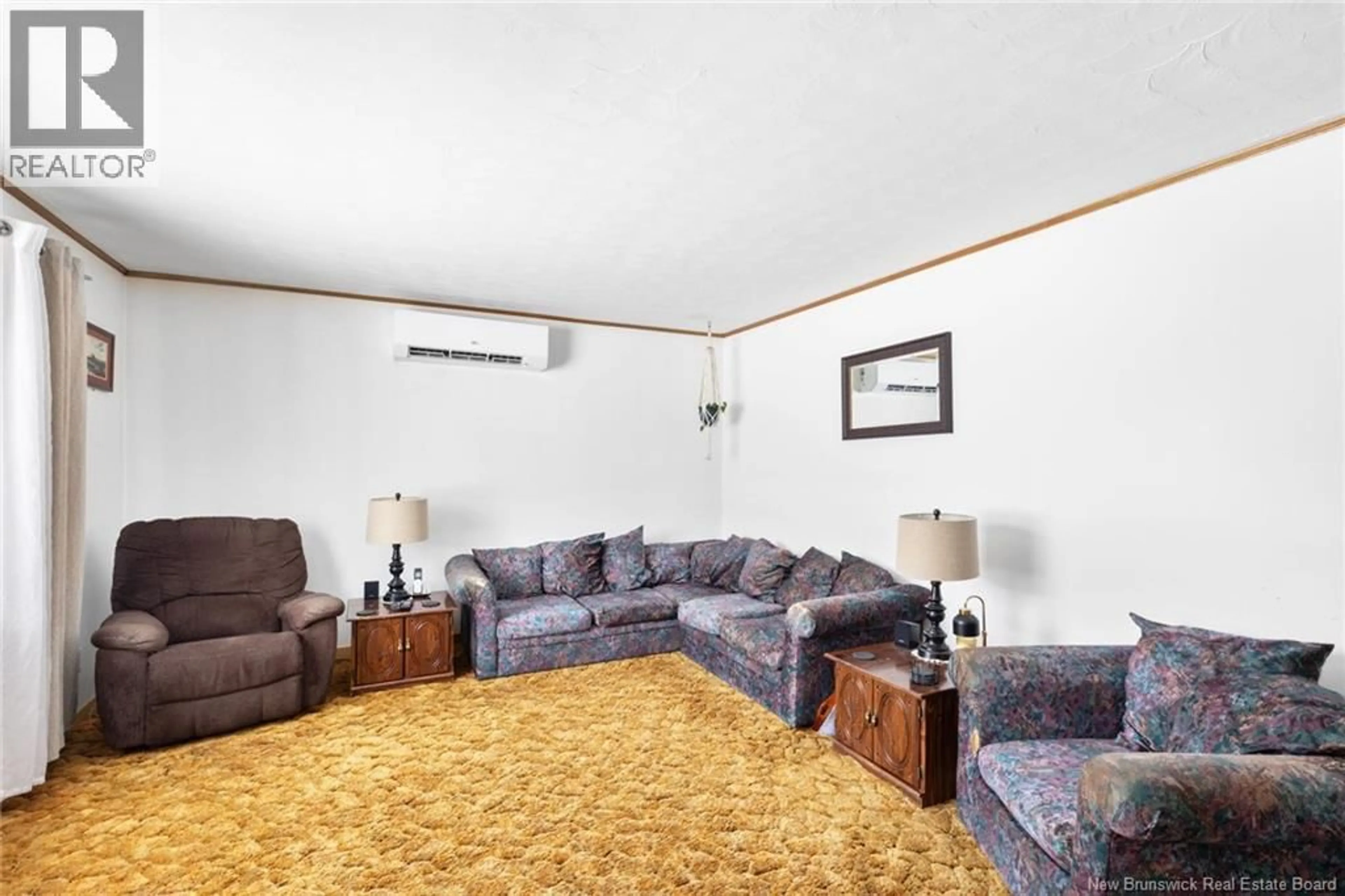 Living room with furniture, carpet floor for 64 MAPLE STREET, Chipman New Brunswick E4A1Y7
