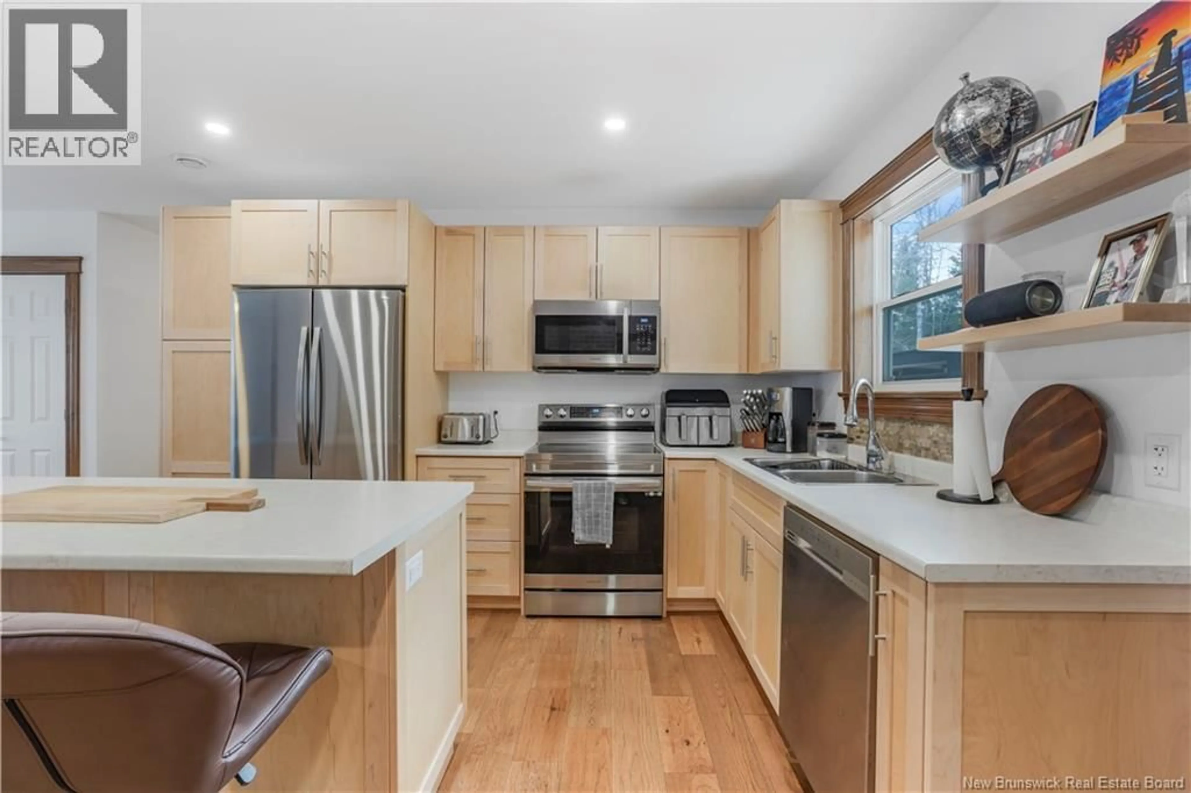 Open concept kitchen, wood/laminate floor for 603 WHITTAKER ROAD, Rusagonis New Brunswick E3B7W8