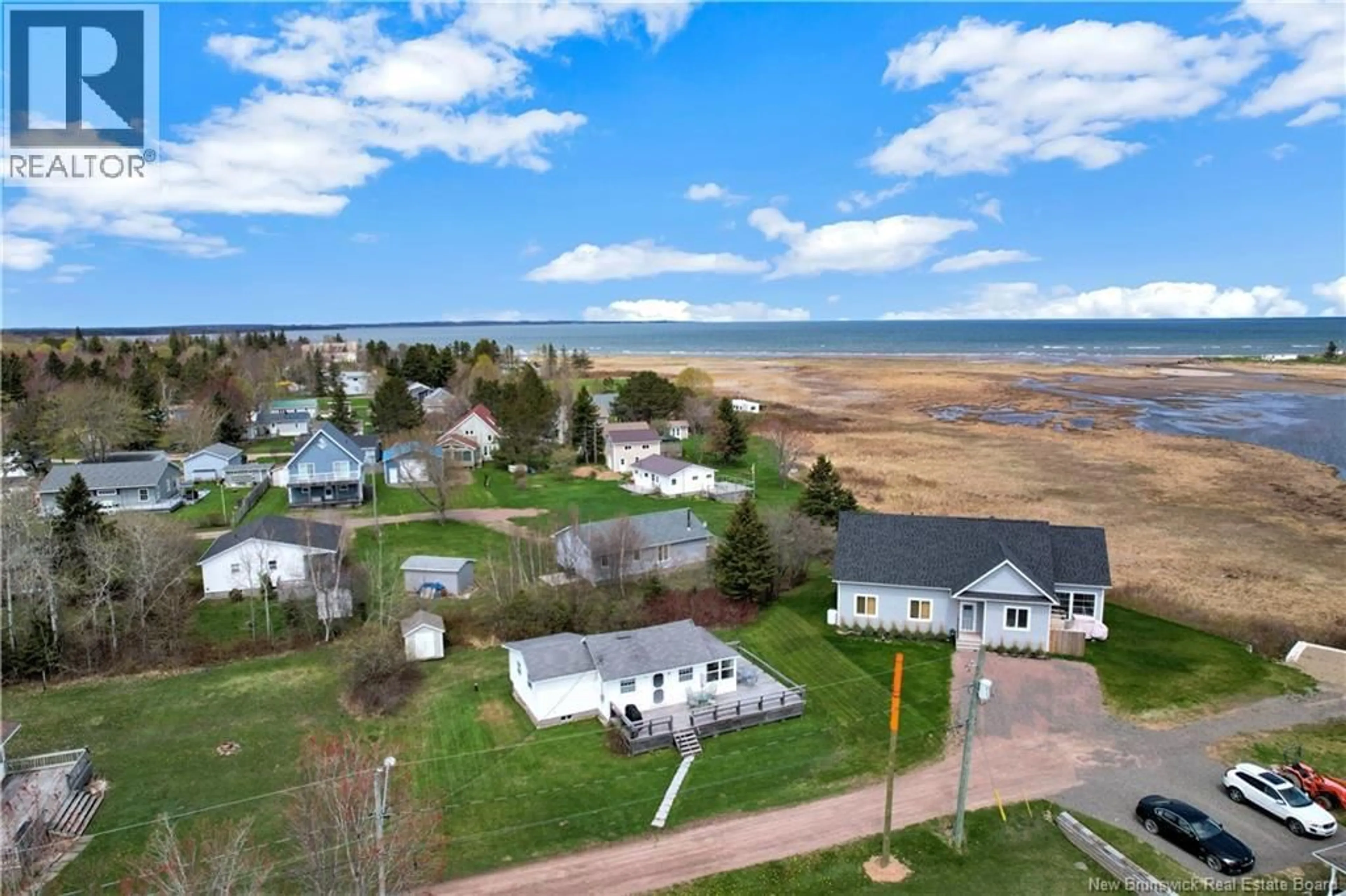 A pic from outside/outdoor area/front of a property/back of a property/a pic from drone, water/lake/river/ocean view for 20 ALLISON LANE, Pointe-Du-Chêne New Brunswick E4P3T6