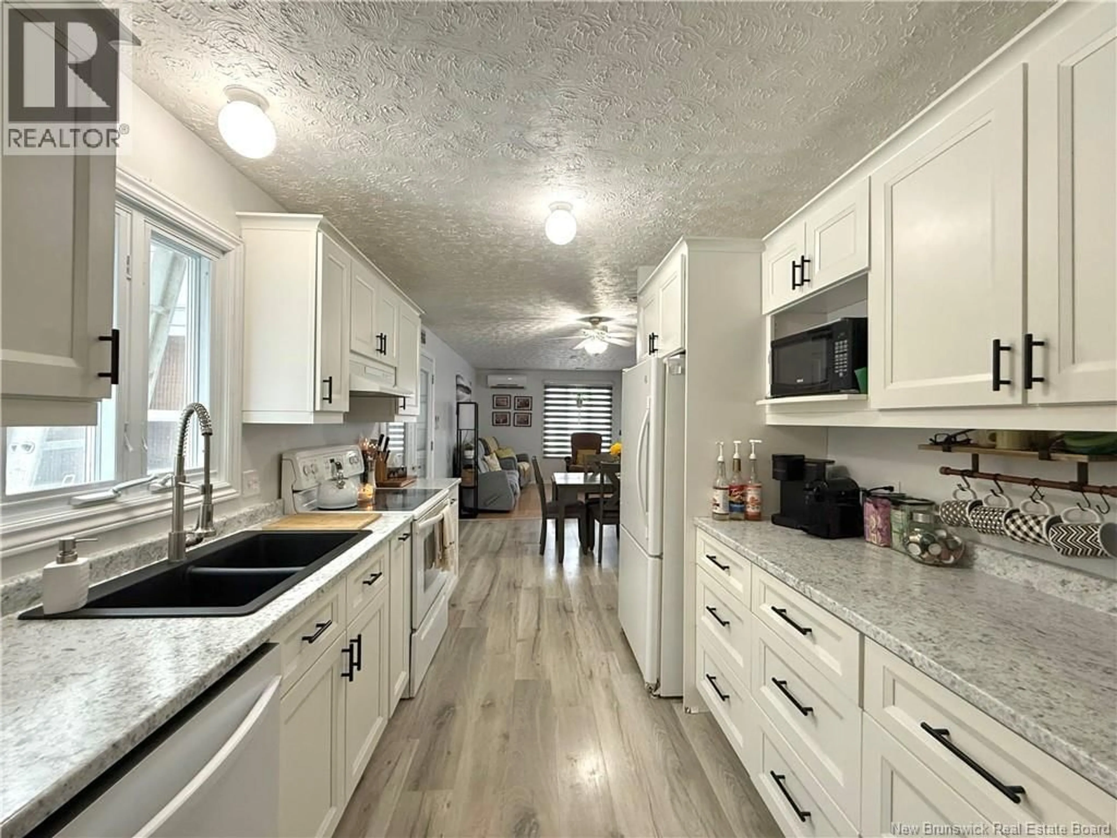 Open concept kitchen, ceramic/tile floor for 15 MARTIN STREET, Clair New Brunswick E7A2G3