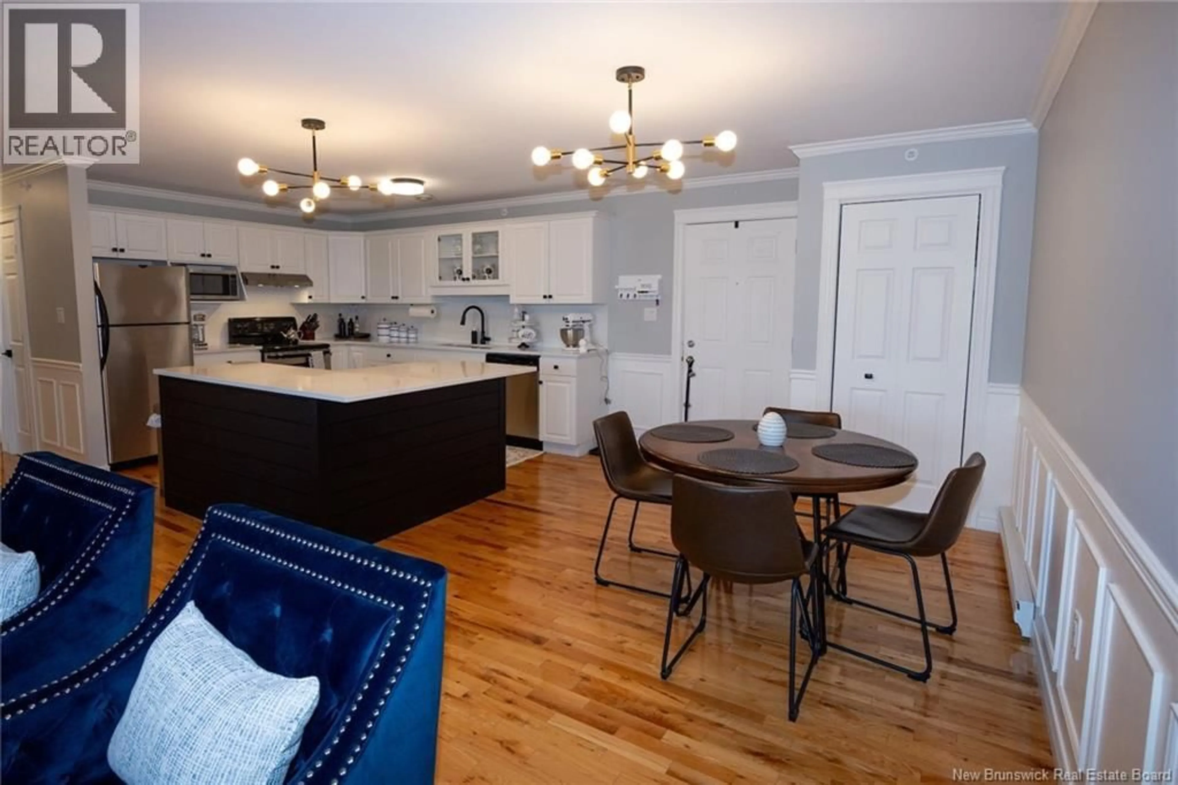 Open concept kitchen, wood/laminate floor for 20 - 35 LIAN STREET, Fredericton New Brunswick E3C0A8