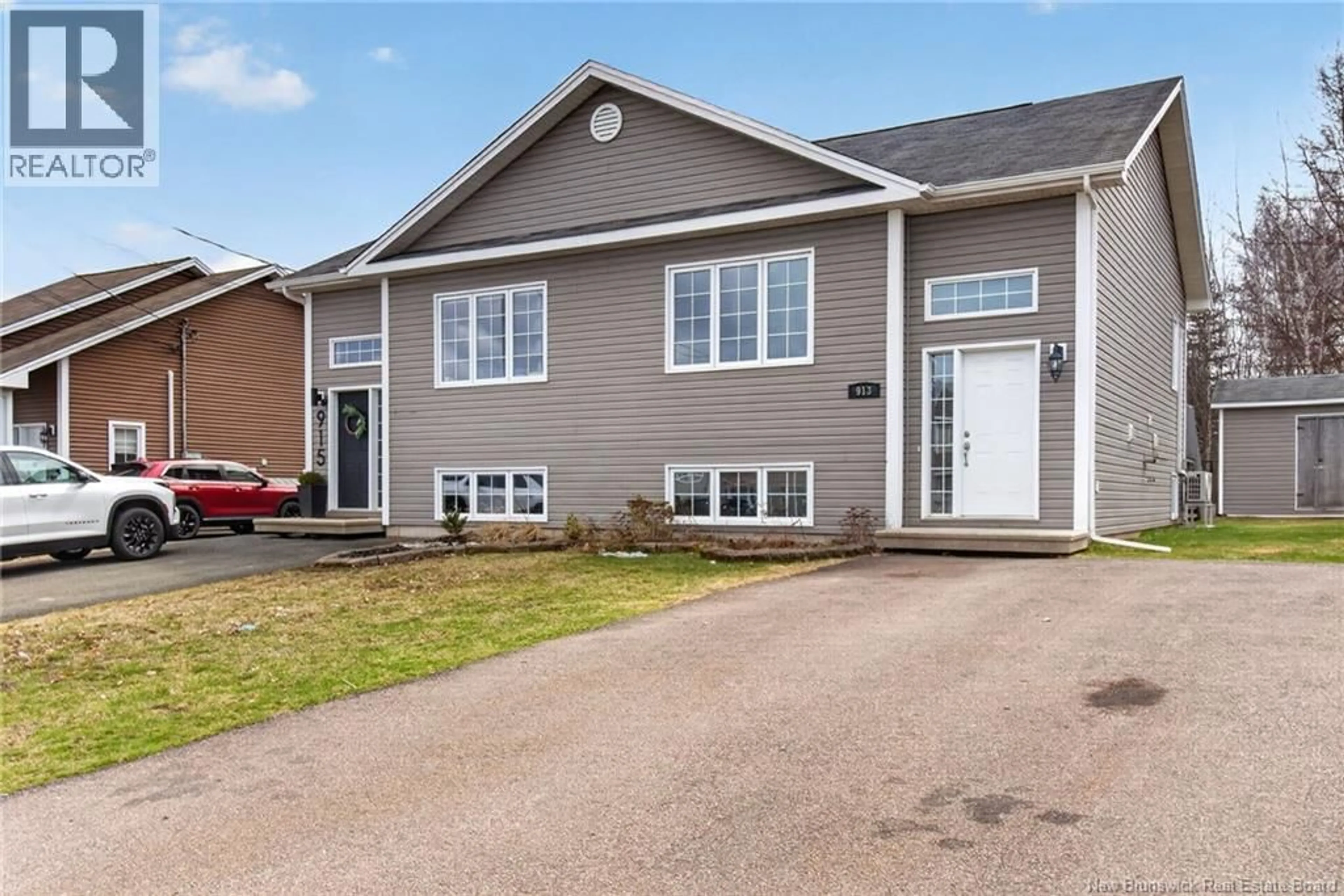 Home with vinyl exterior material, street for 913 BERNARD, Dieppe New Brunswick E1A4A6